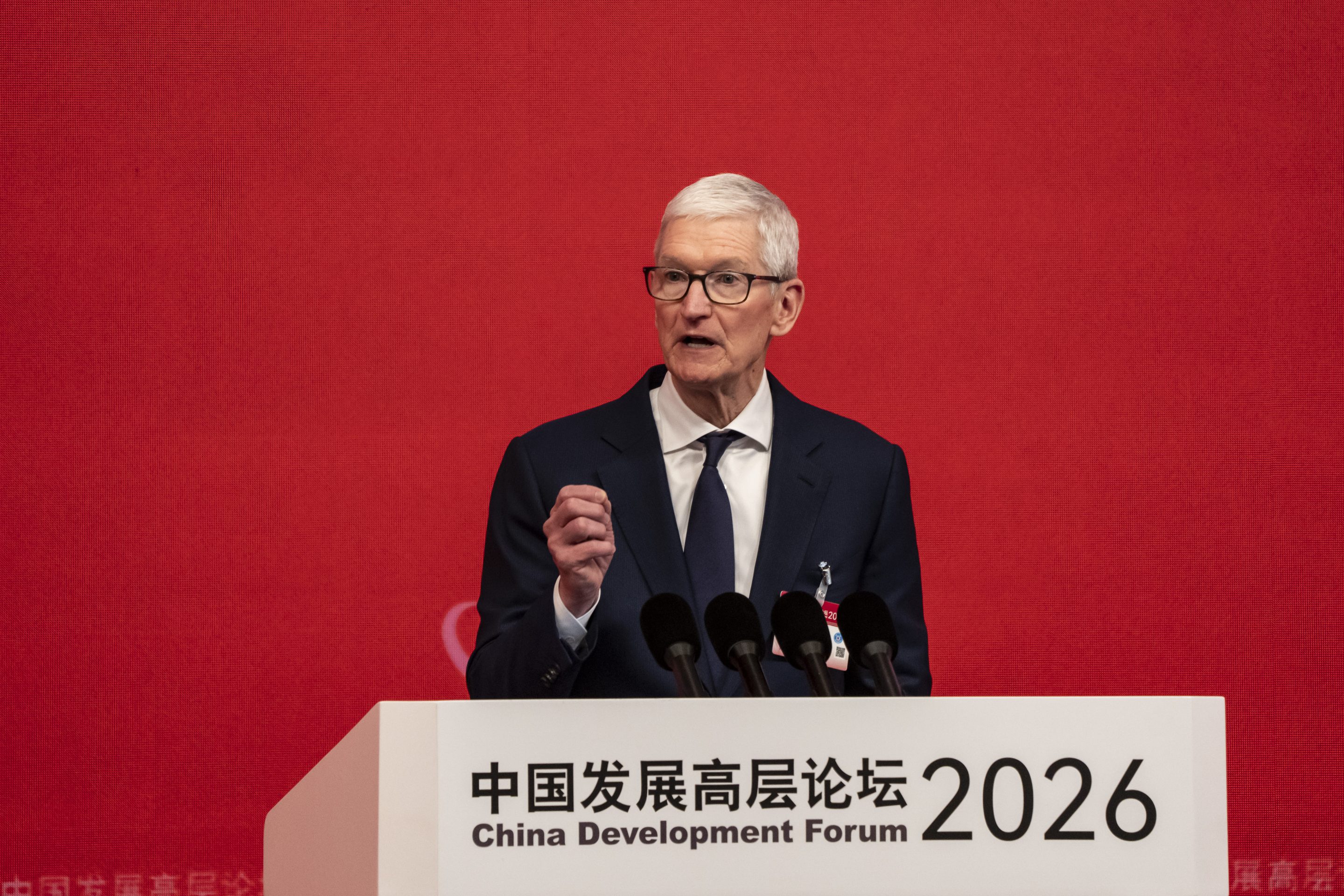 Tim Cook, chief executive officer of Apple Inc., speaks at the China Development Forum in Beijing, China, on Sunday, March 22, 2026.