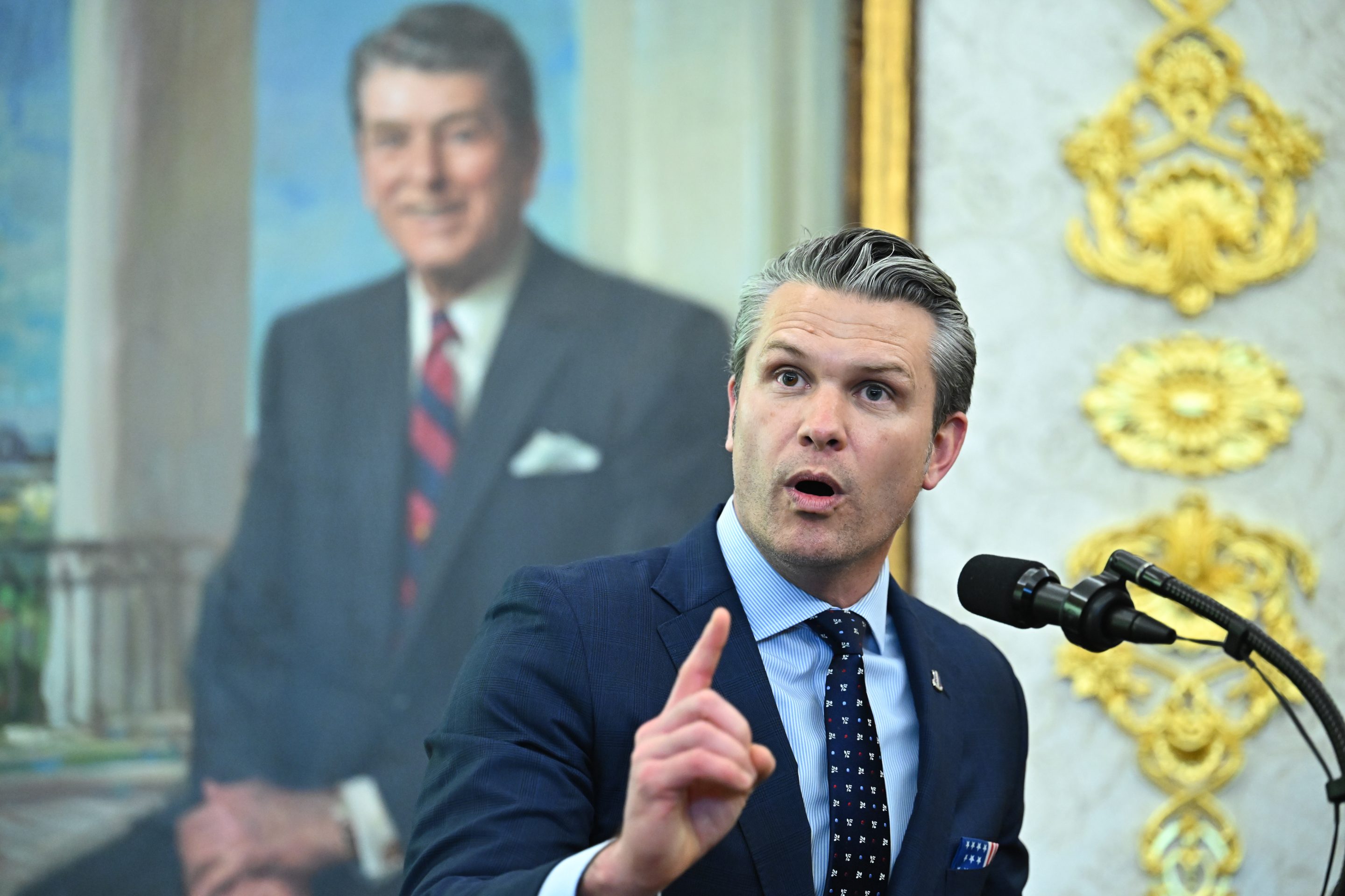 Pete Hegseth, U.S. secretary of defense, speaks during a swearing-in ceremony in the Oval Office of the White House in Washington, DC, US, on Tuesday, March 24, 2026. 