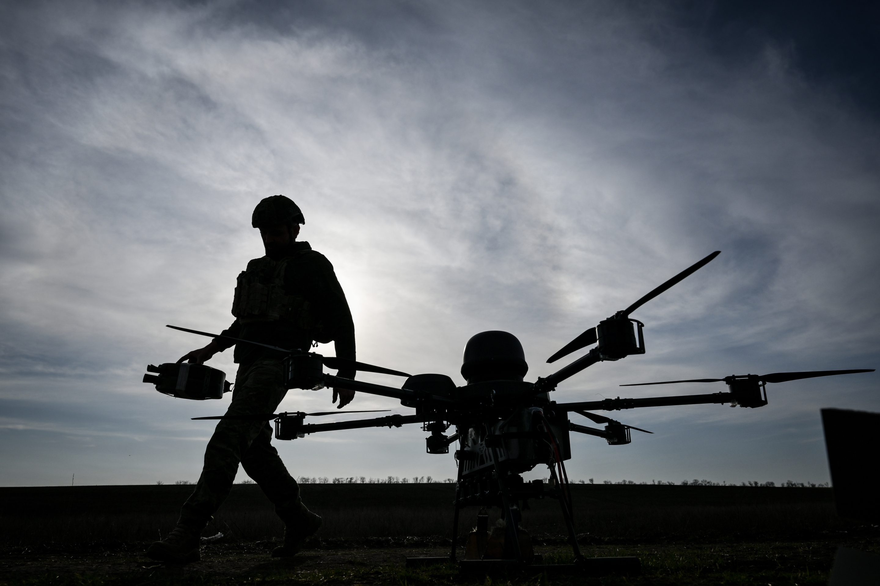 A Ukrainian soldier prepares a heavy bomber drone, March 23, 2026.