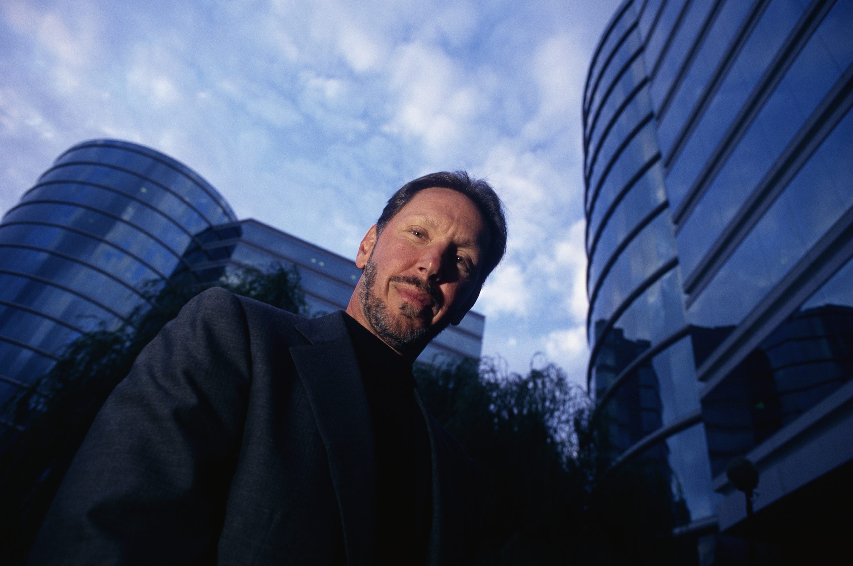 Oracle Chairman and then-CEO Larry Ellison in front of the company's California headquarters in 2000.