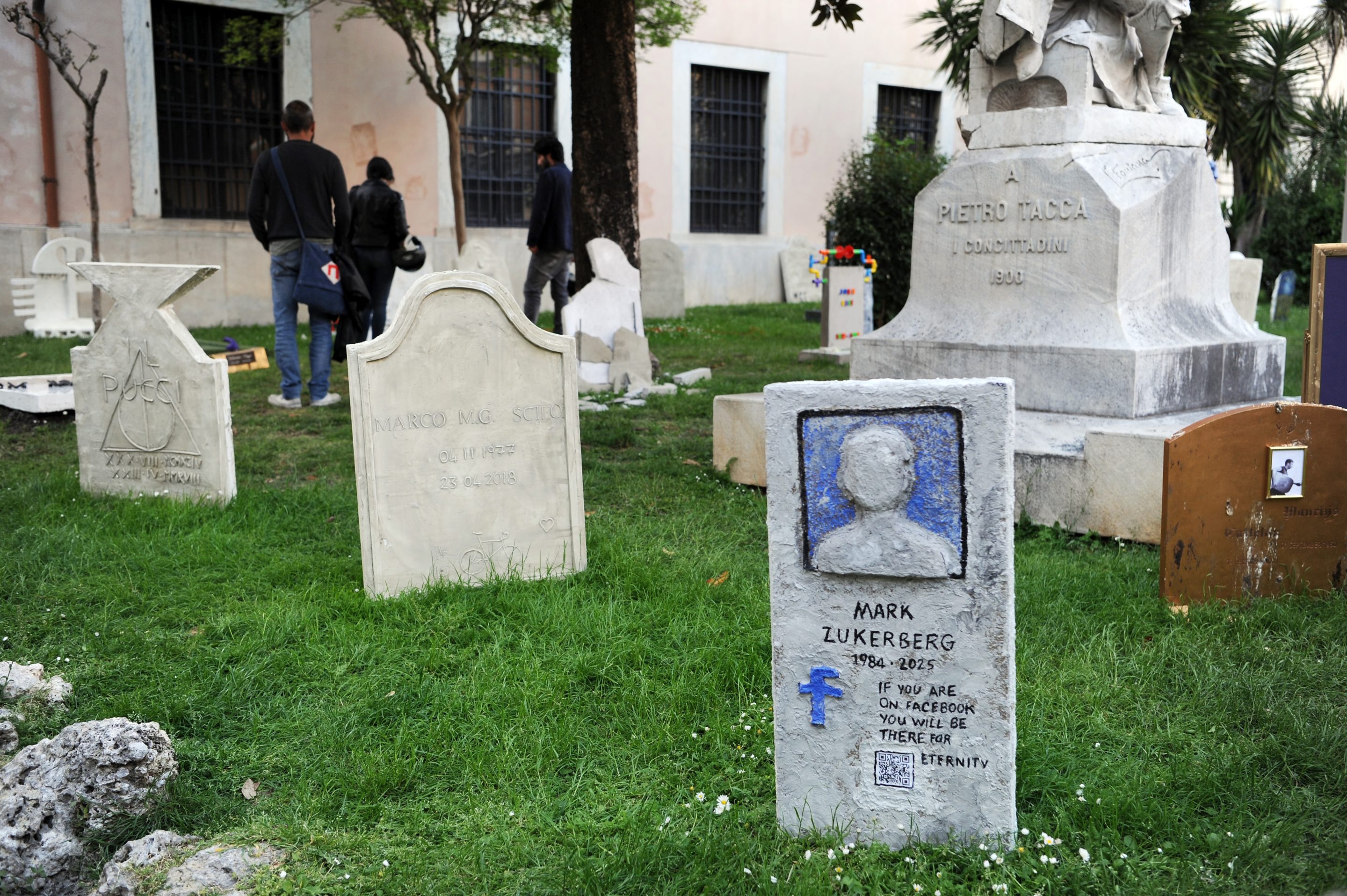 Artist Maurizio Cattelan created the art installation Eternity in Carrara, Italy, covering a theme on death and funeral rituals, showing a tombstone a warning of one's likeness living an eternity on Facebook.
