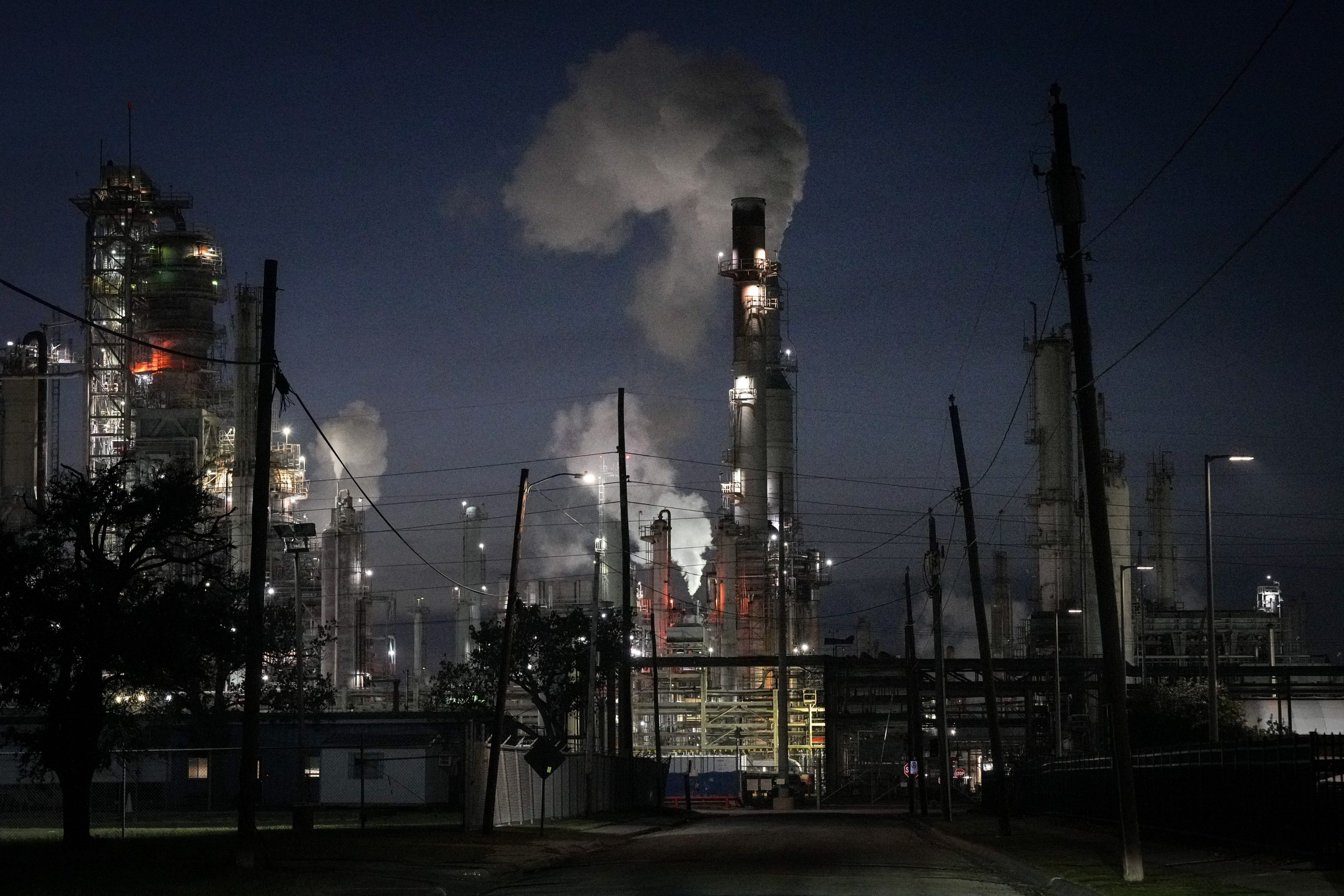 A Citgo oil refinery operates next to the Hillcrest neighborhood Thursday, Nov. 16, 2023, in Corpus Christi, Texas. 