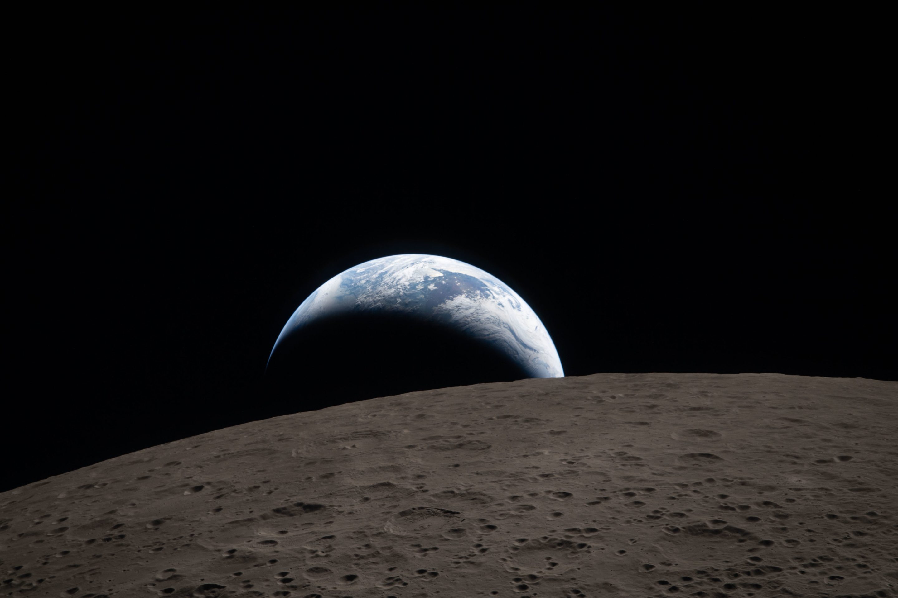 In this image provided by NASA, The Artemis II crew captured this view of an Earthset on Monday, April 6, 2026, as they flew around the Moon. 