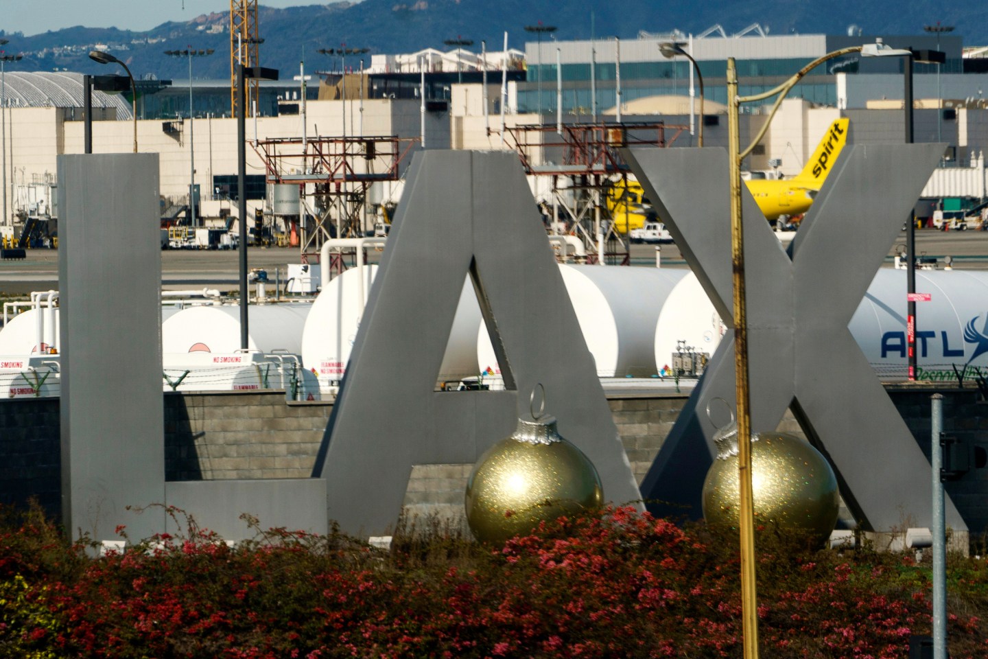 Feds arrest a Los Angeles woman at LAX on suspicion of helping Iran traffic weapons to Sudan