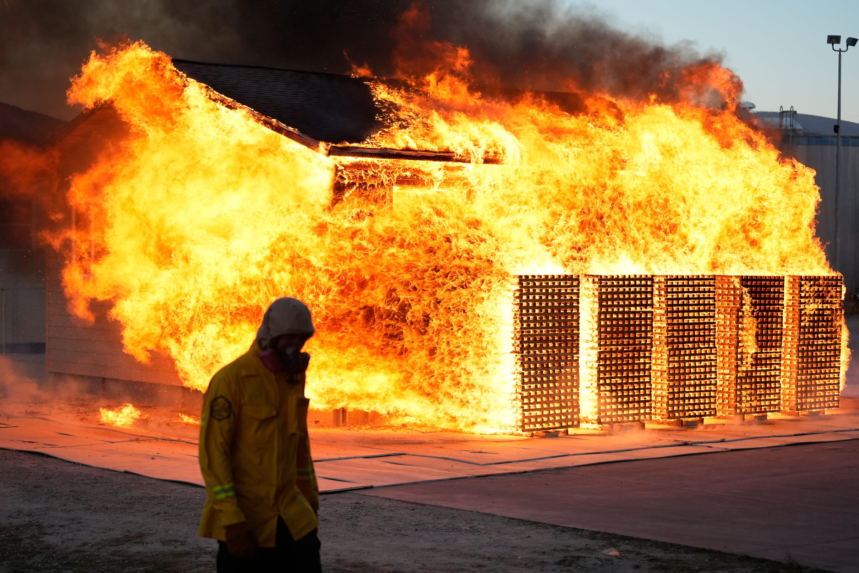 Scientists are burning homes to better protect them in wildfires.