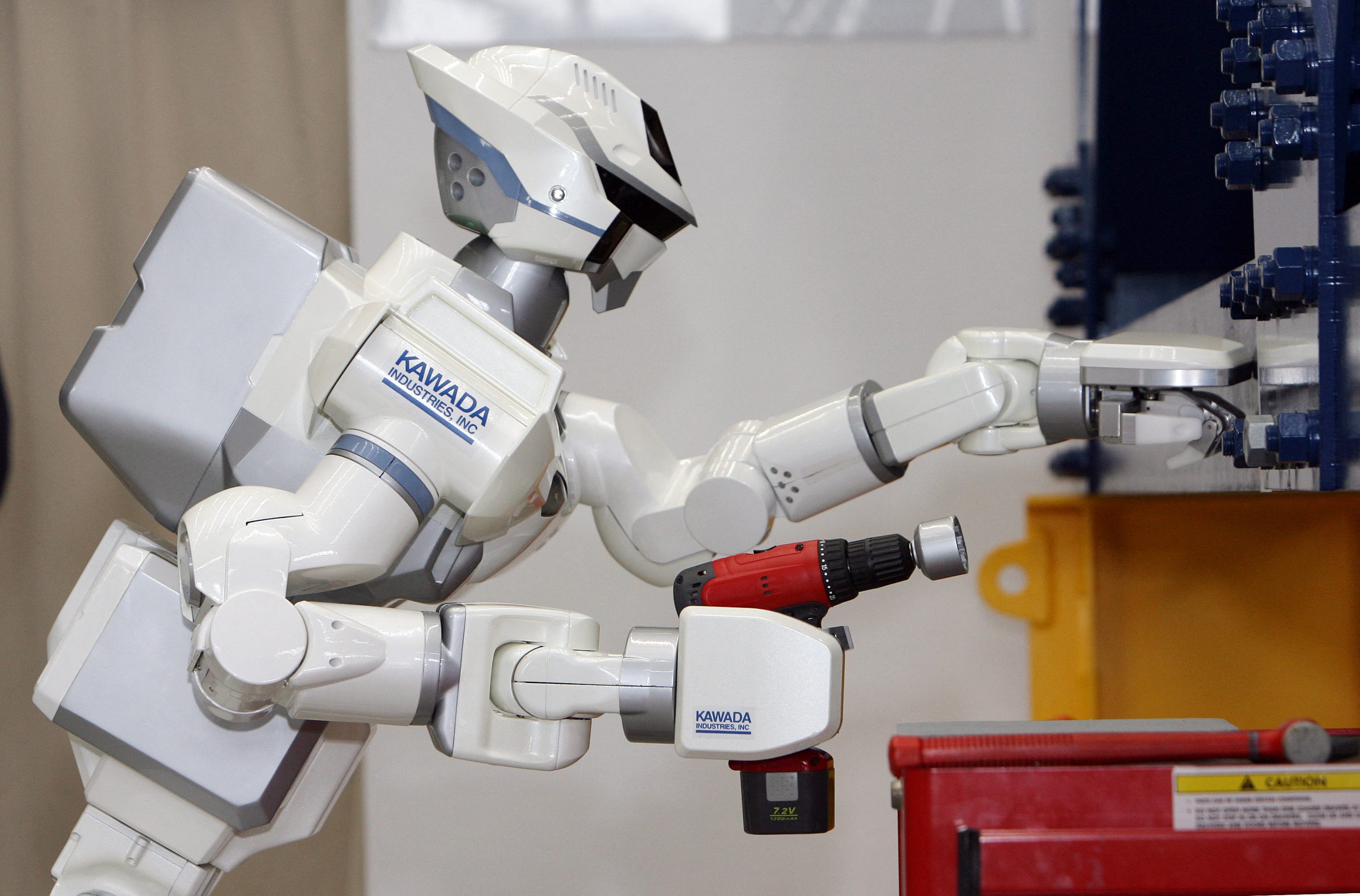 robot with drill in arm