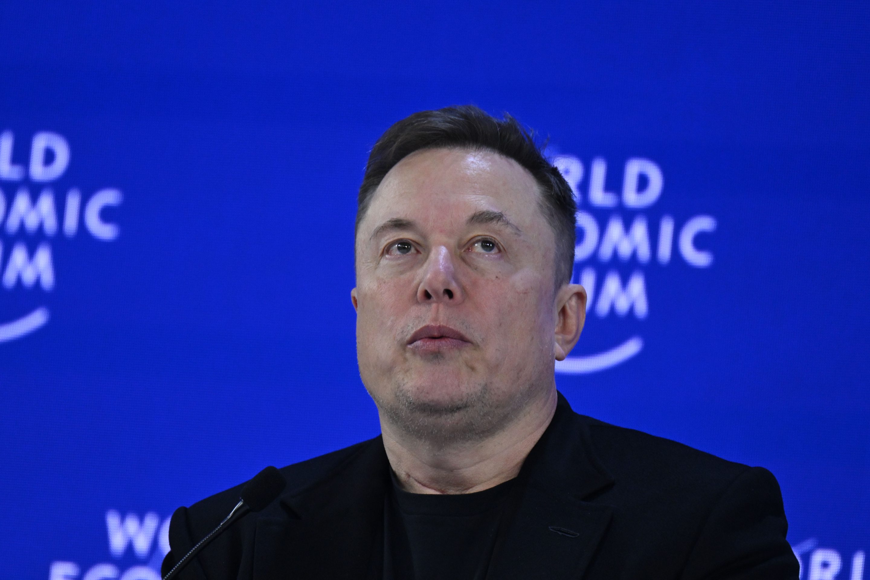 Elon Musk delivers a speech during the World Economic Forum Annual Meeting in Davos, Switzerland, on January 22, 2026.