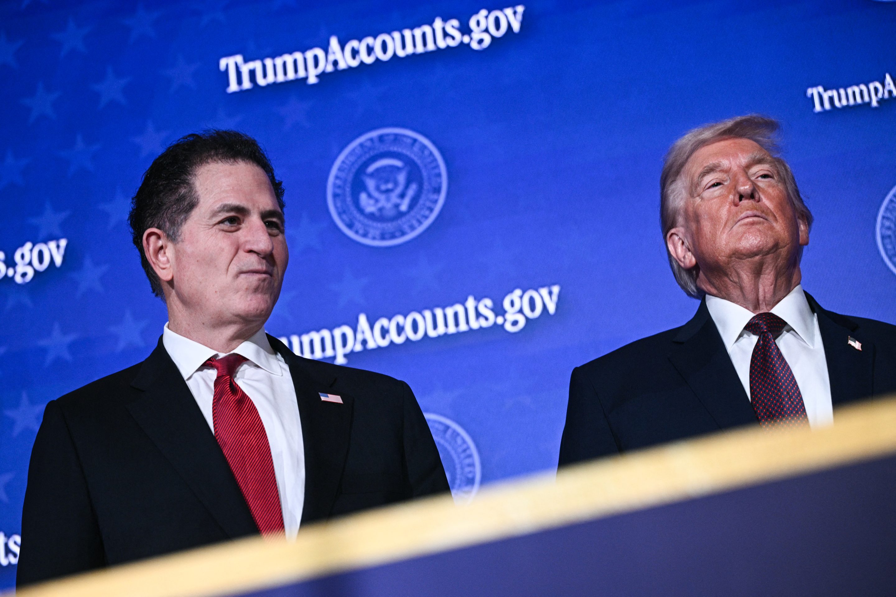 President Donald Trump with Dell CEO Michael Dell at an event on 'Trump Accounts' at the Andrew W. Mellon Auditorium in Washington, DC, on January 28, 2026.