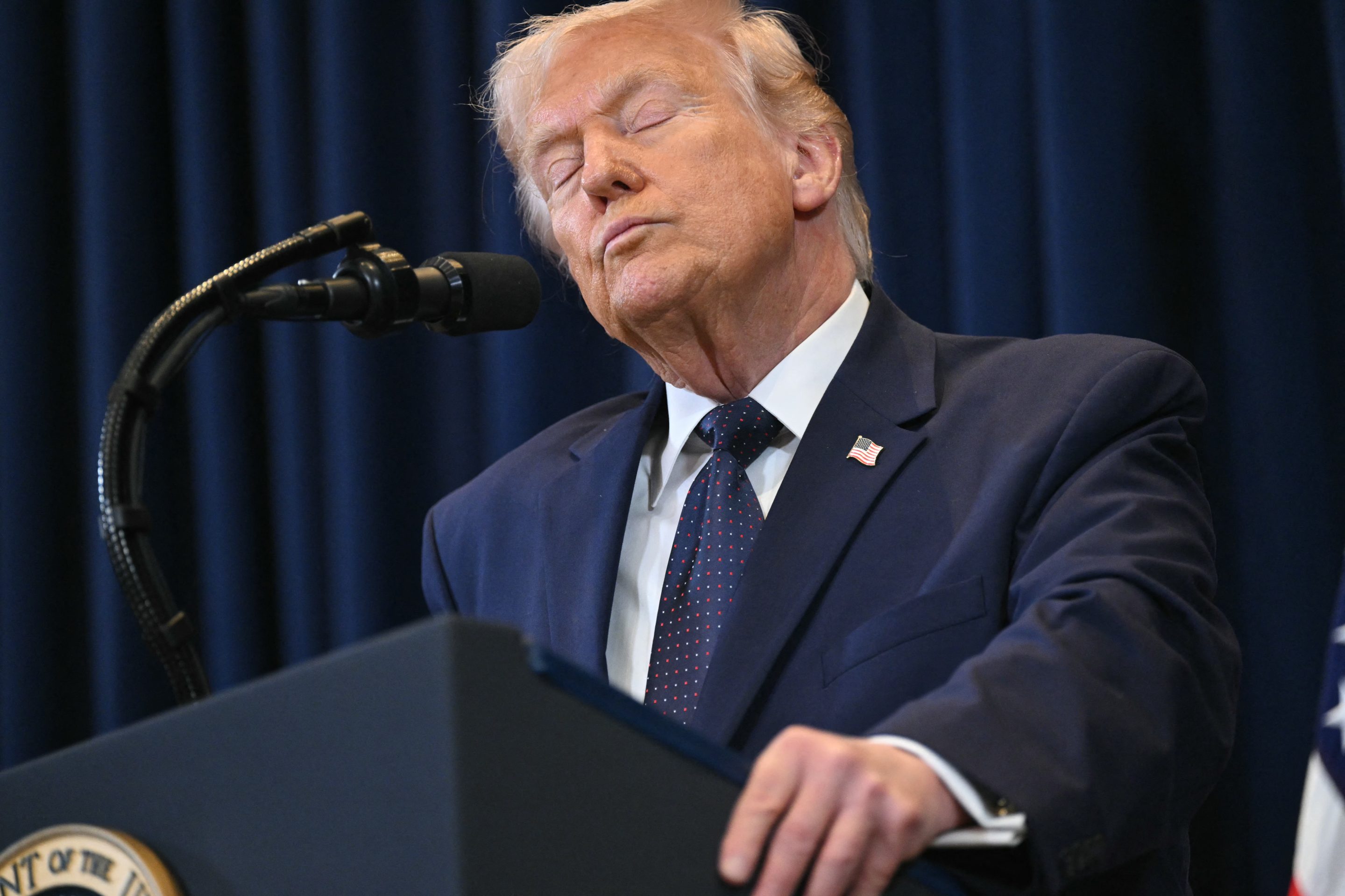 Trump at a podium
