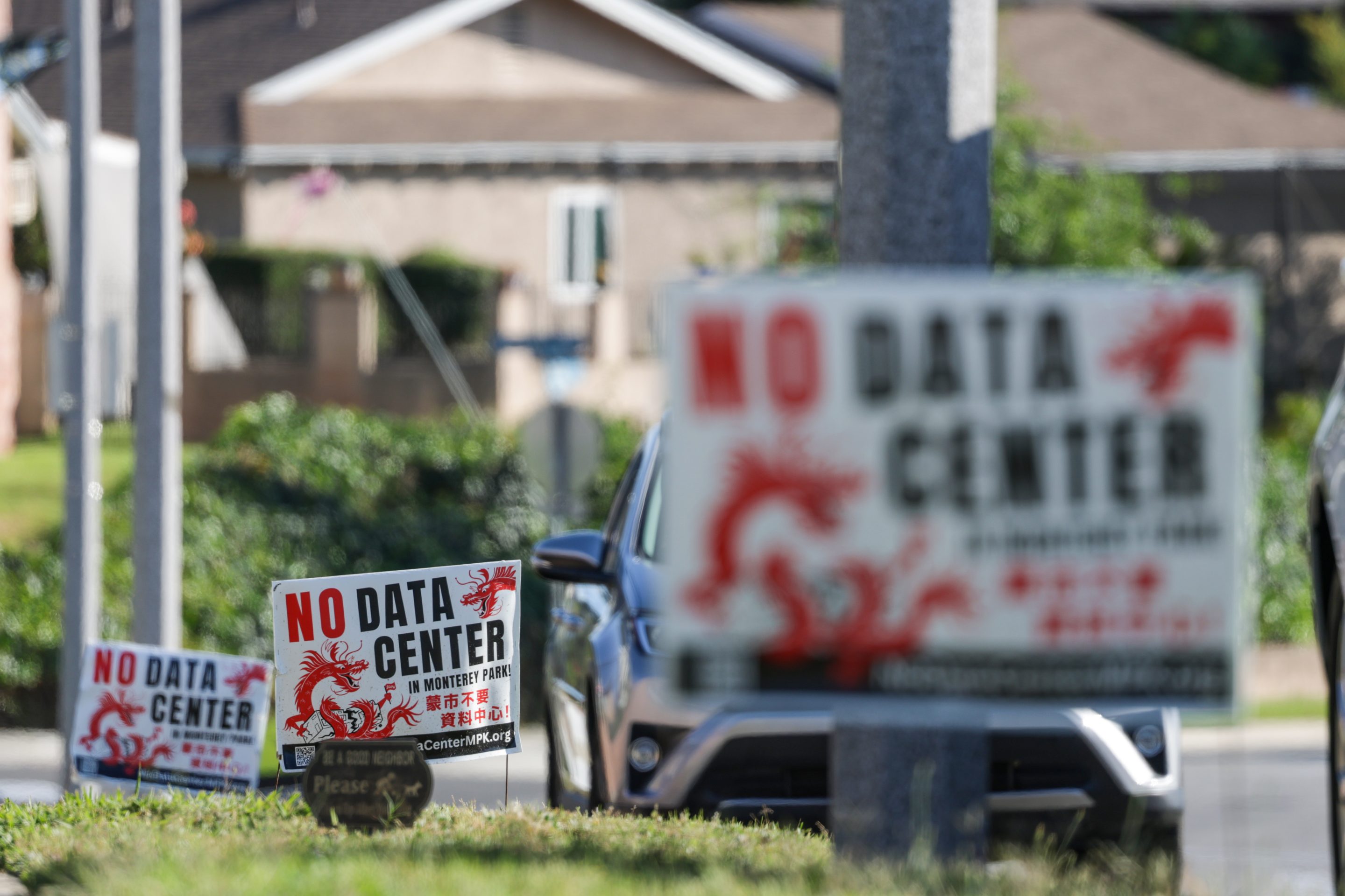 Signs opposing a proposed data center in Monterey Park, CA.