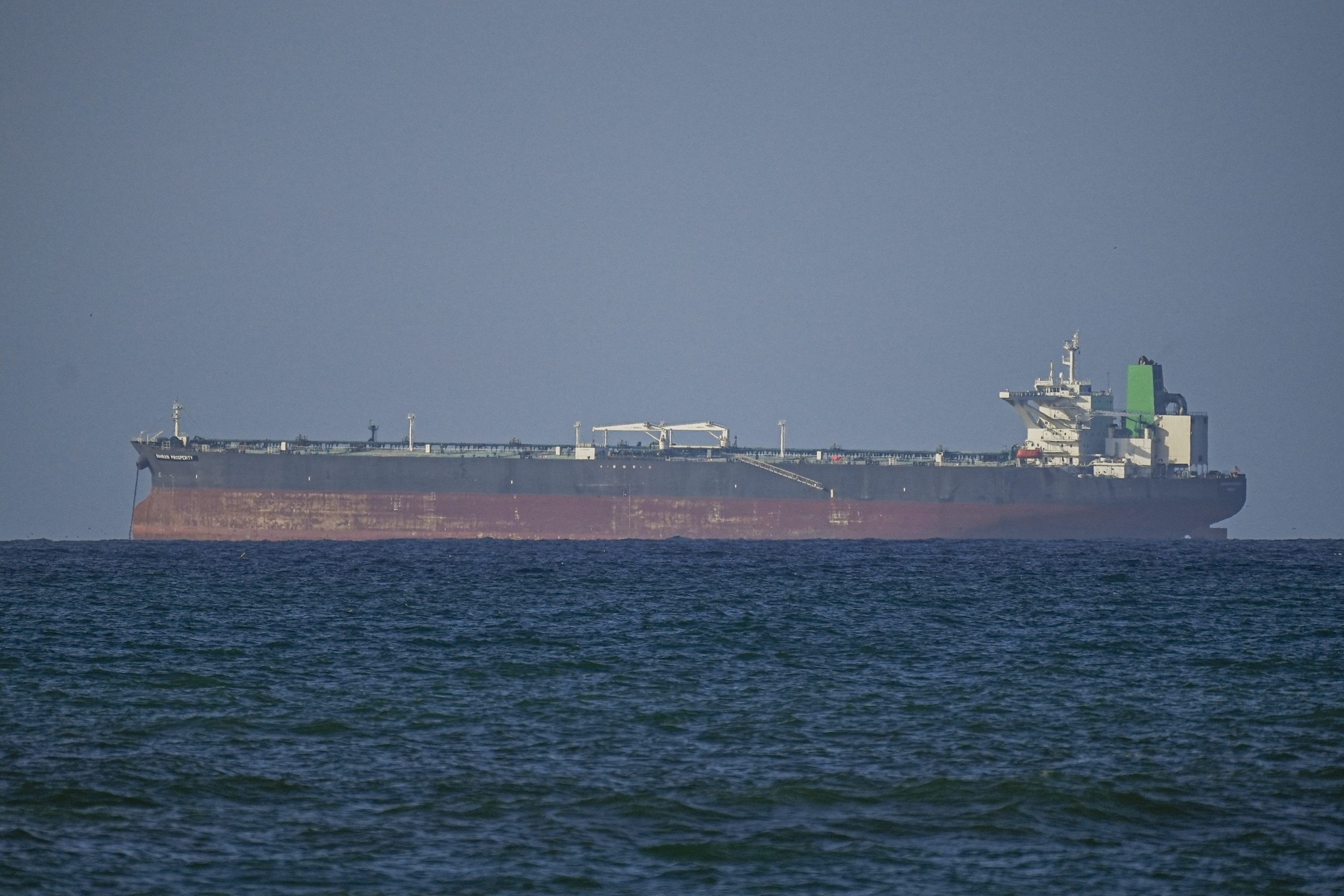 A view of the vessels passing through Strait of Hormuz following the two-week temporary ceasefire reached between the United States and Iran on the condition that the strait be reopened, seen in Oman on April 8, 2026.