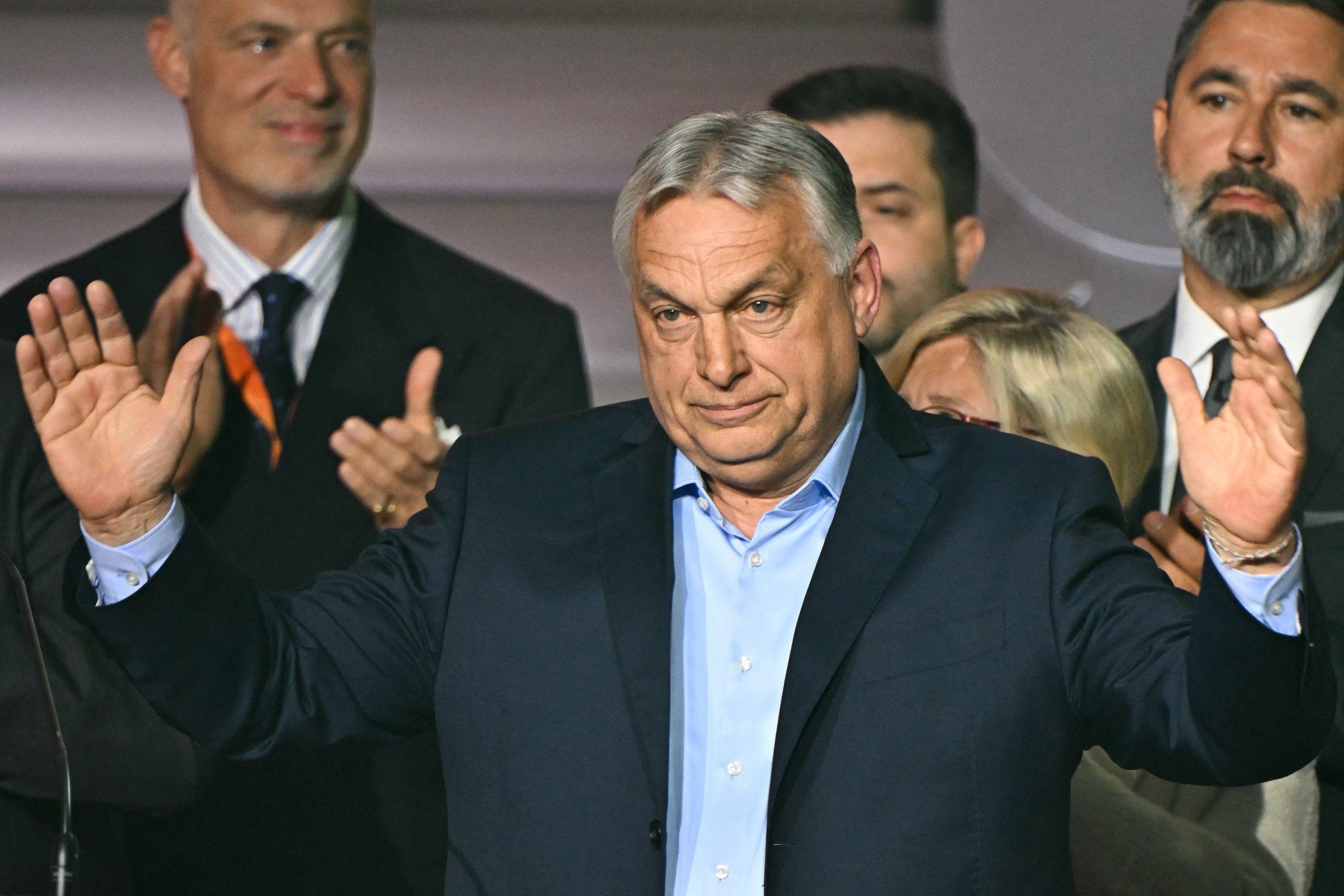 Hungarian Prime Minister Viktor Orban waves to supporters at the Balna centre in Budapest during Hungary's general election on April 12, 2026.