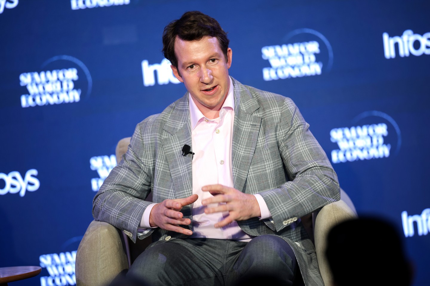 The billionaire Anthropic cofounder who majored in literature says knowing how to ask the right questions beats knowing how to code