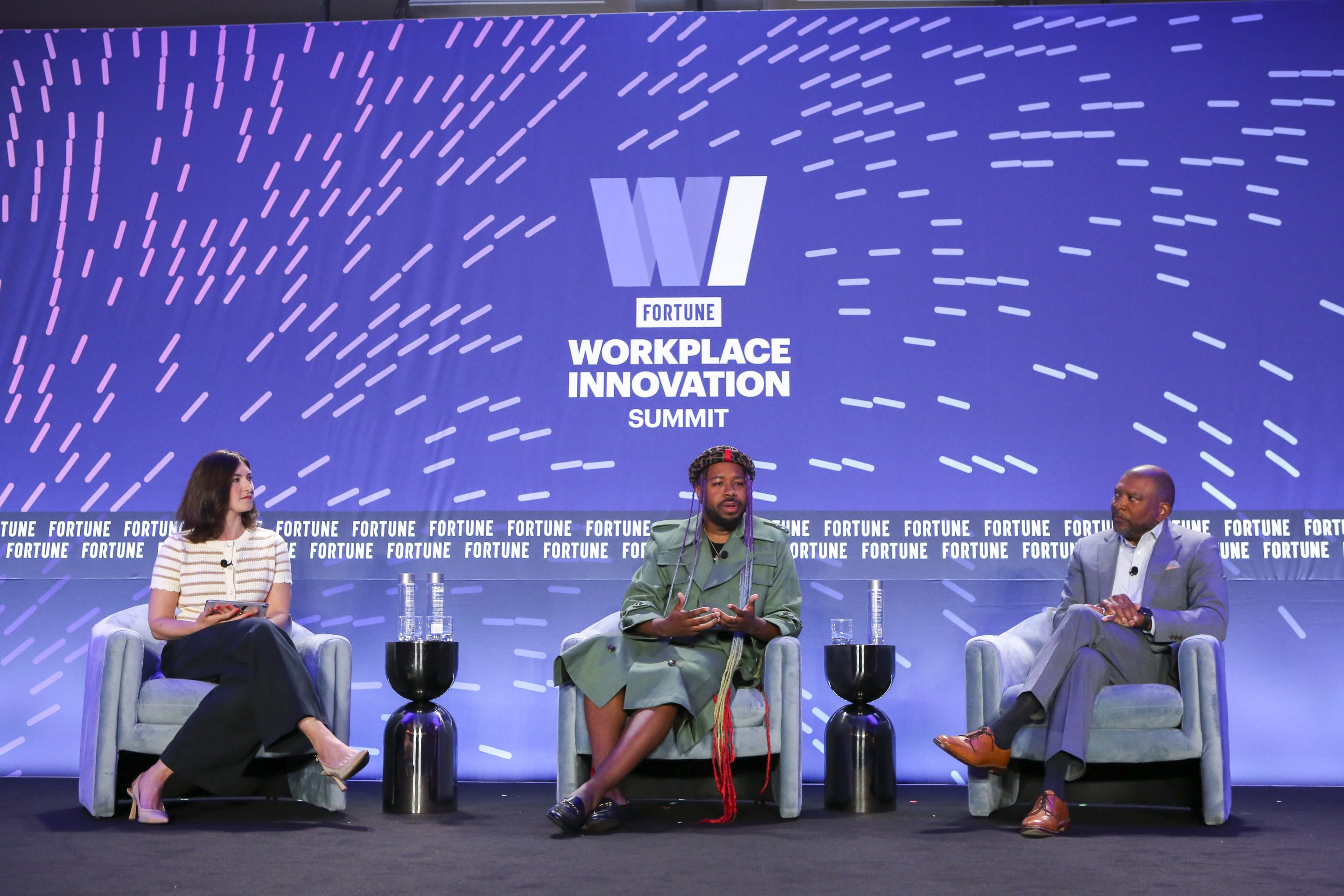 Jarvis Sam (center) the former chief diversity officer at Nike and now the CEO of DEI firm, The Rainbow Disruption, sits next to Ray Dempsey (right), a former chief diversity officer at BP and Barclays and now the founder of Dempsey Inclusion Group.