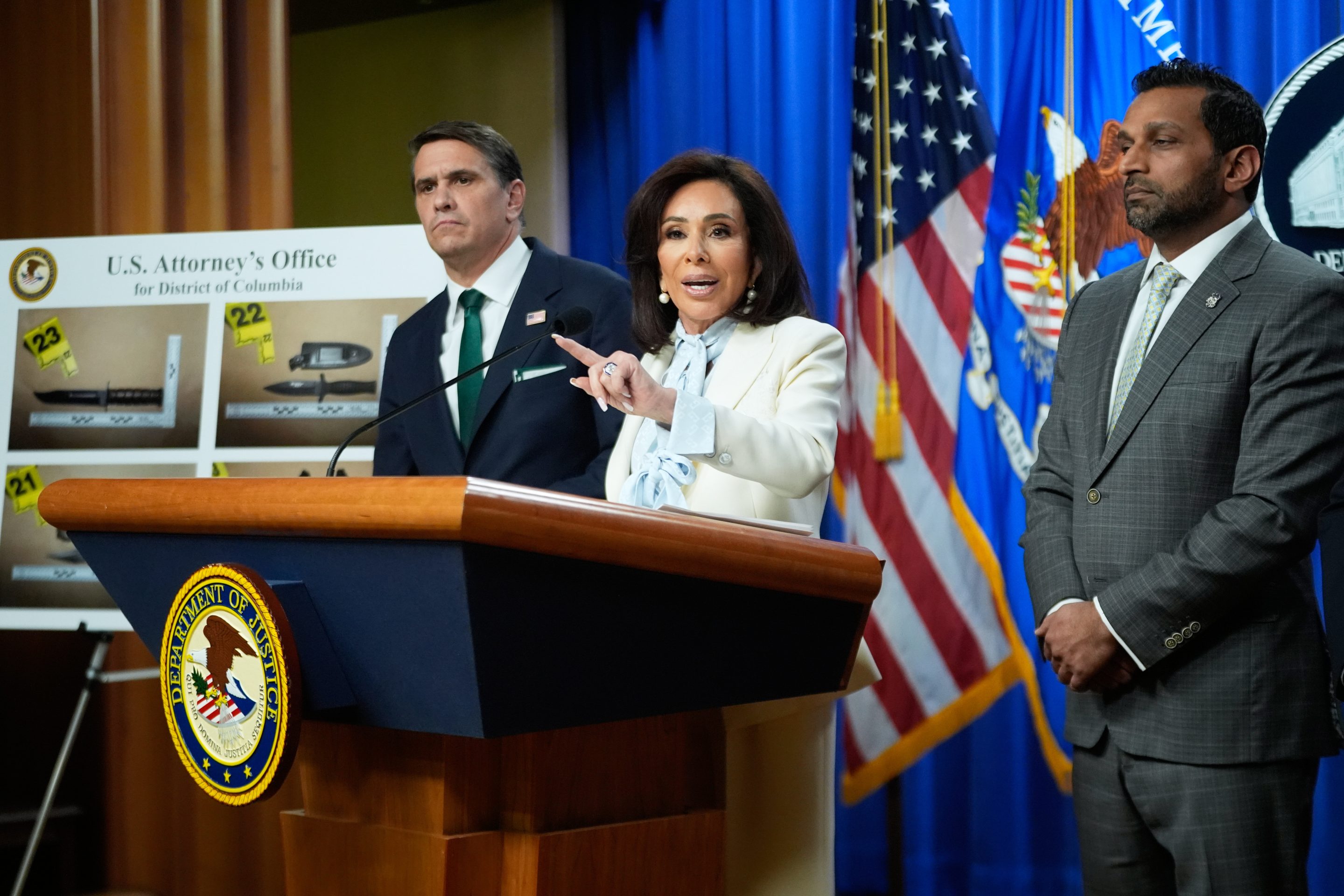 From left, Acting Attorney General Todd Blanche, U.S. Attorney Jeanine Pirro and FBI Director Kash Patel, speak during a news conference at the Department of Justice, on Monday April 27, 2026, in Washington.