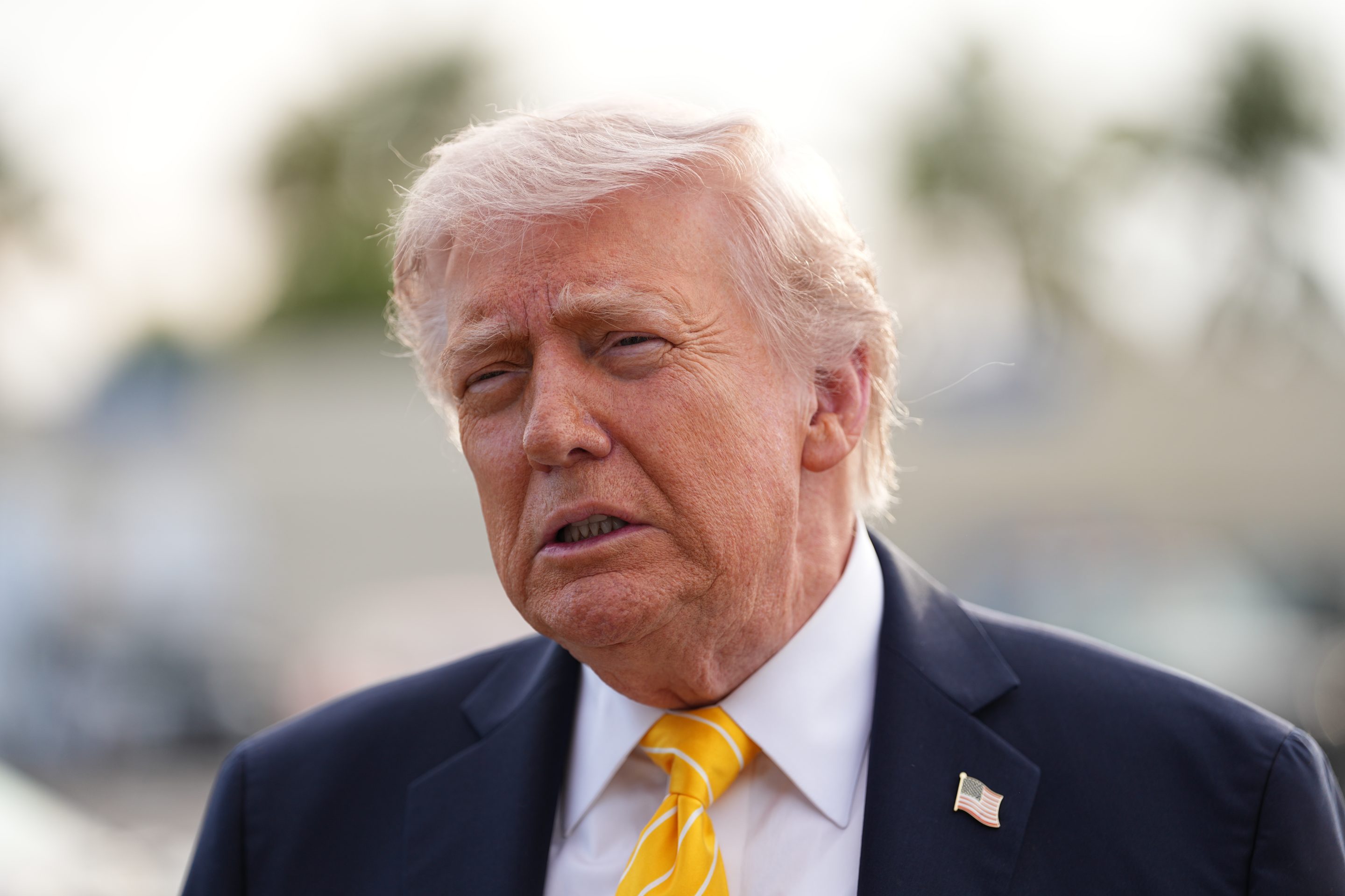 President Donald Trump talks to reporters before he boards Air Force One at Palm Beach International Airport in West Palm Beach, Fla., Saturday May 2, 2026, en route Miami.