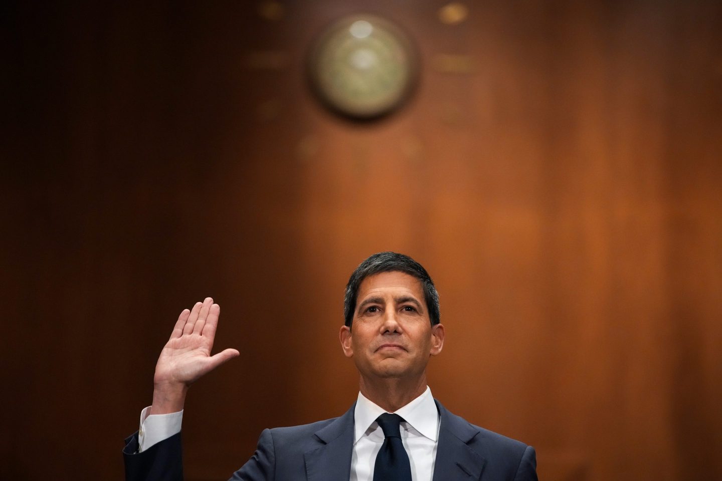 Kevin Warsh, U.S. President Donald Trump's nominee for Chair of the Federal Reserve, is sworn in to testify during his Senate Committee on Banking, Housing, and Urban Affairs confirmation hearing in the Dirksen Senate Office Building on April 21, 2026 in Washington, DC.