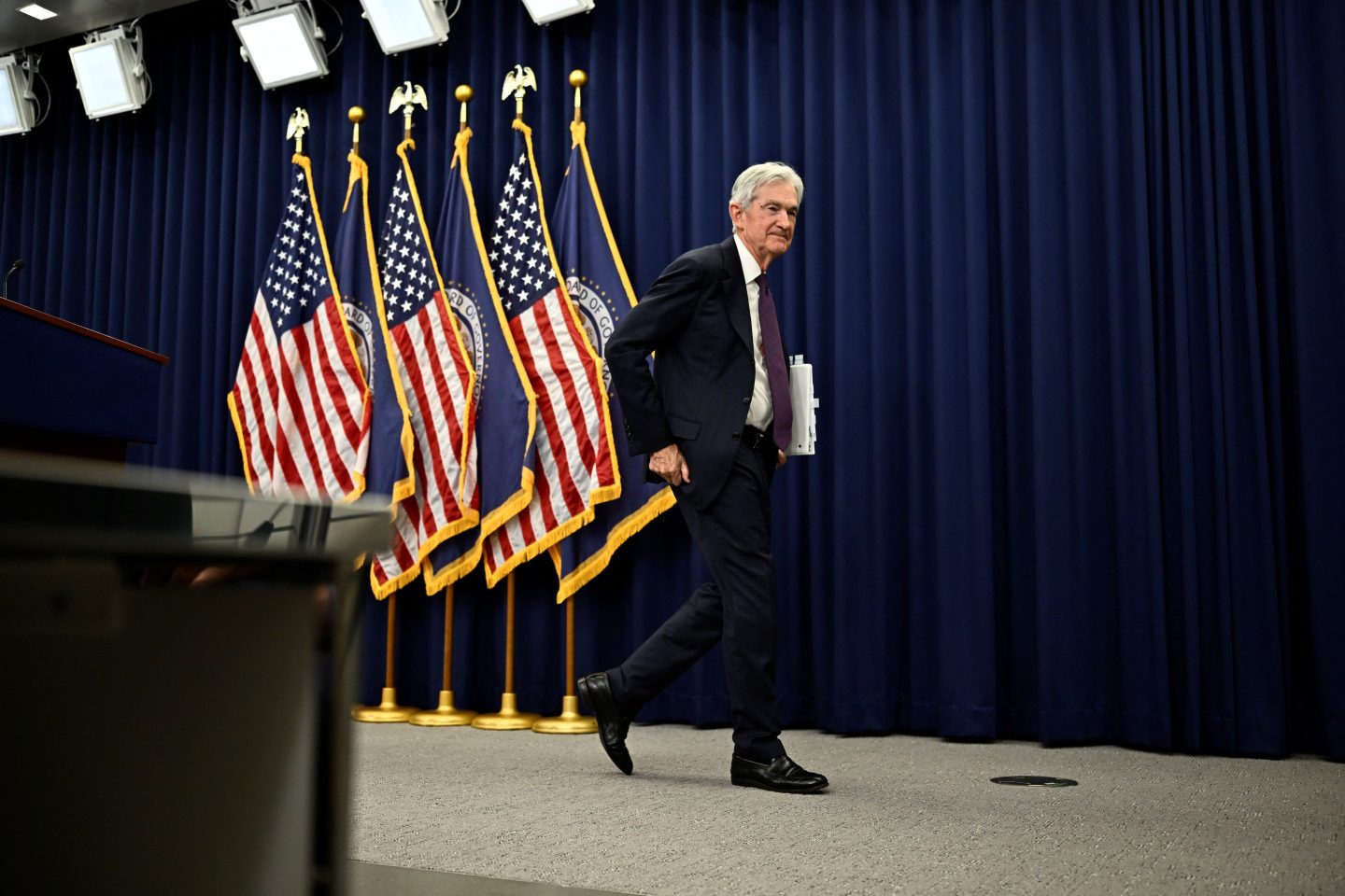 US Federal Reserve Chair Jerome Powell departs a press conference at the Federal Reserve Board Building in Washington, DC, on April 29, 2026.