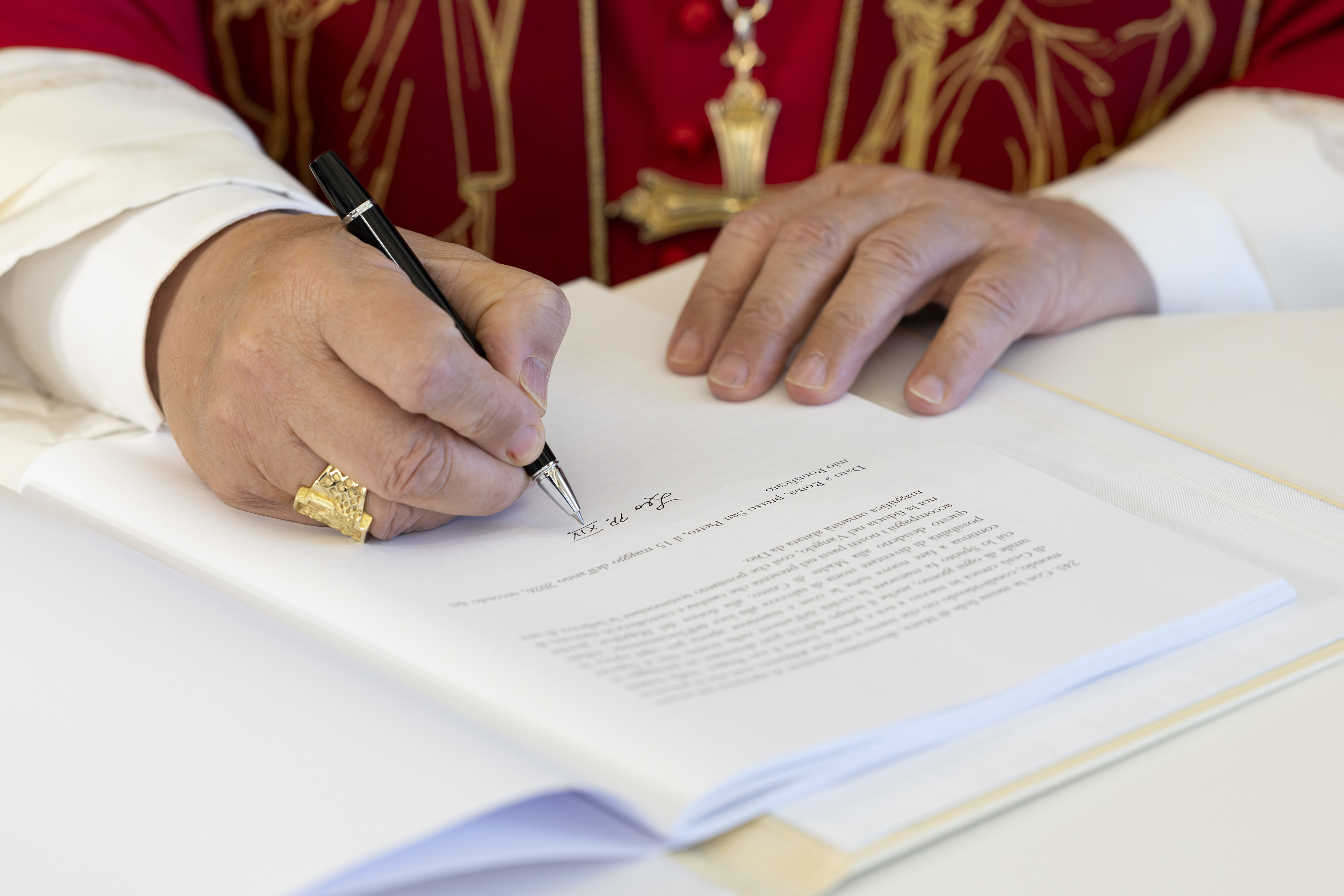 Pope Leo XIV signs "Magnifica humanitas" at the Apostolic Palace on May 25, 2026 in Vatican City, Vatican. (Photo: Simone Risoluti/Vatican Media/Vatican Pool/Getty Images)