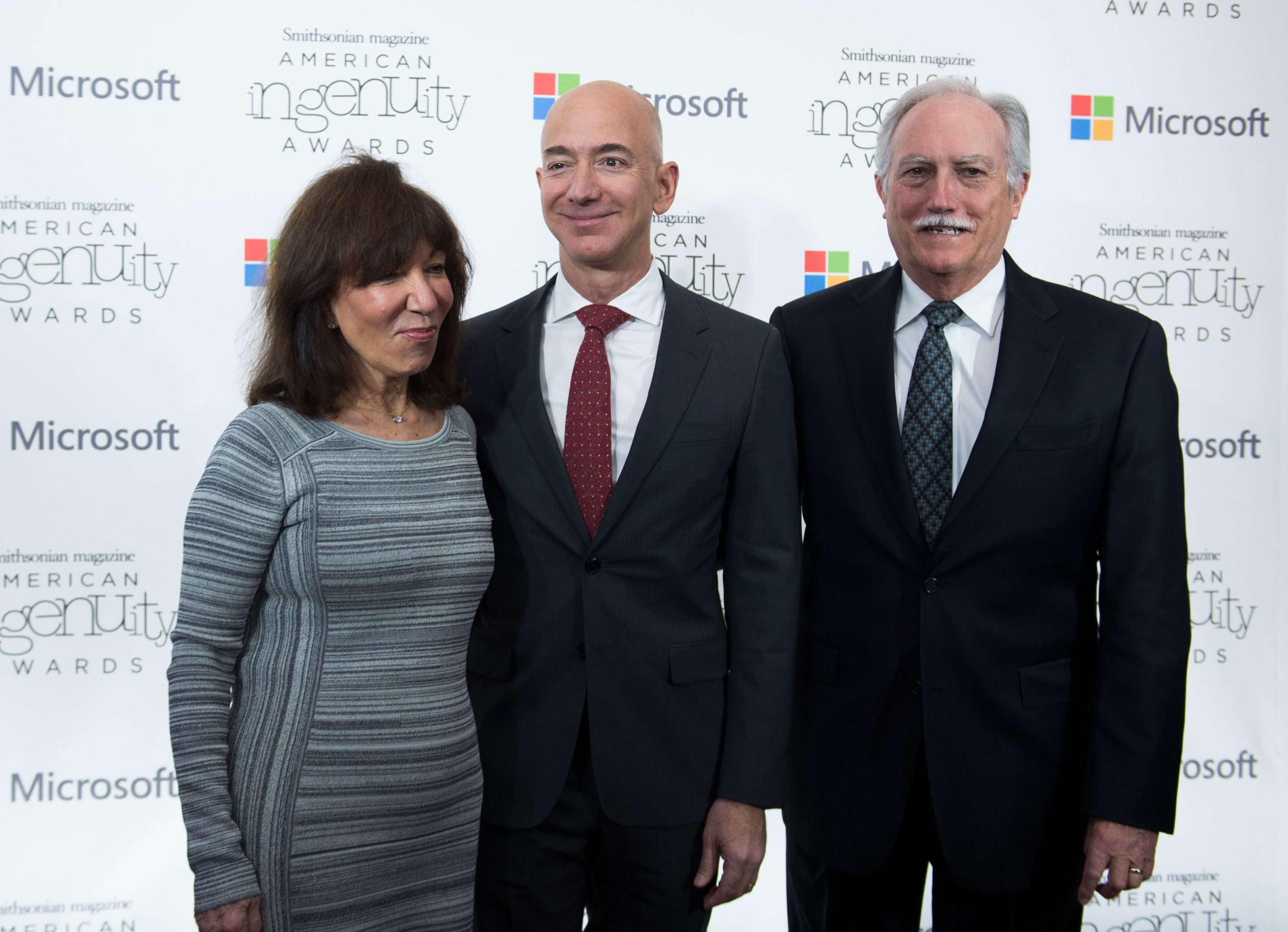 Amazon CEO Jeff Bezos (center) with his parents, Mike and Jackie