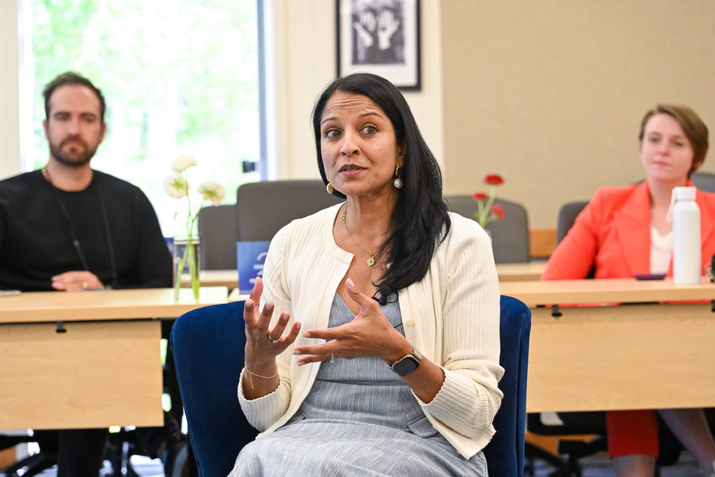 Seated woman speaking
