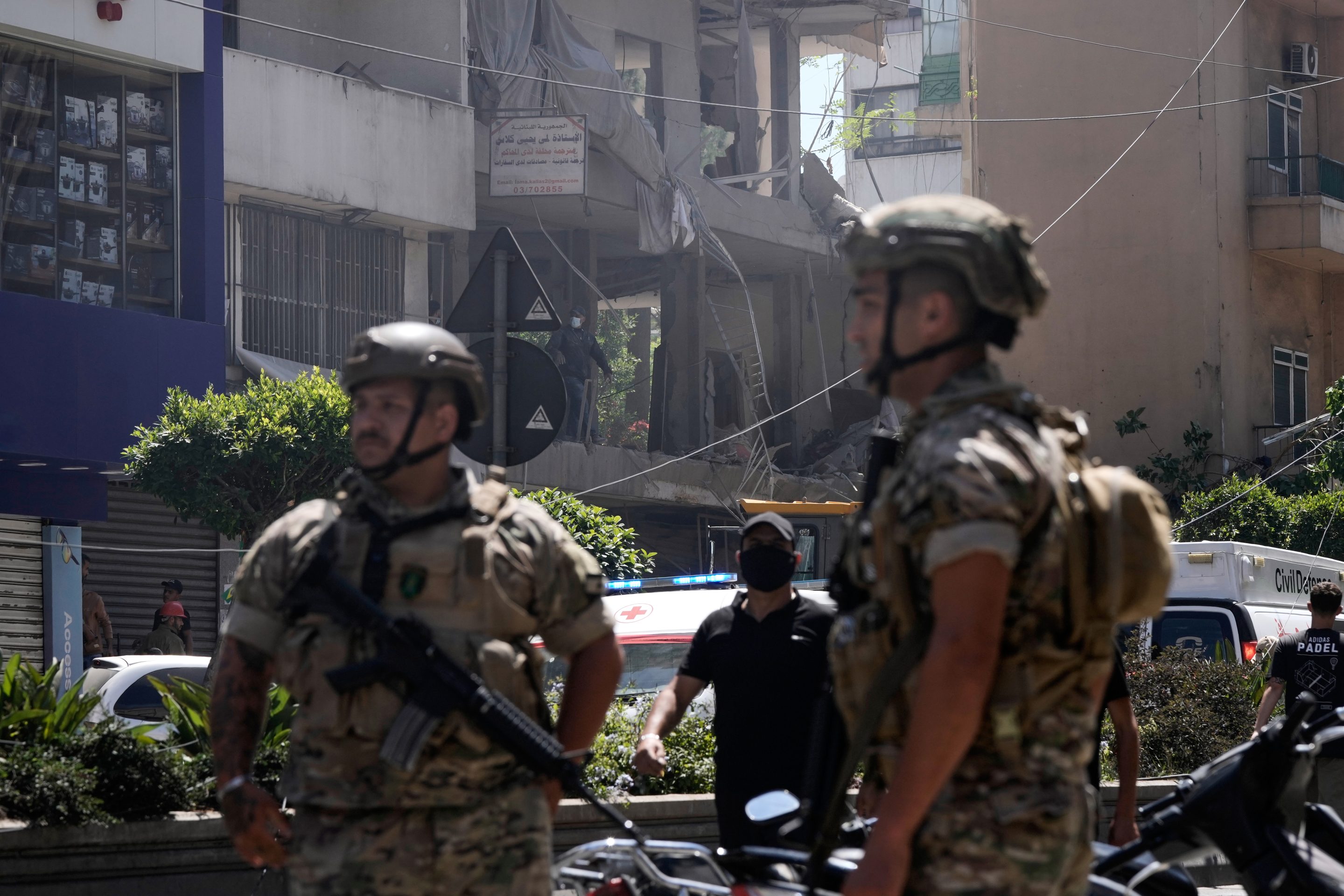 Lebanese soldiers stand guard at the site of an Israeli airstrike that struck an apartment in Dahiyeh, Beirut's southern suburbs, Lebanon, Sunday, June 14, 2026.