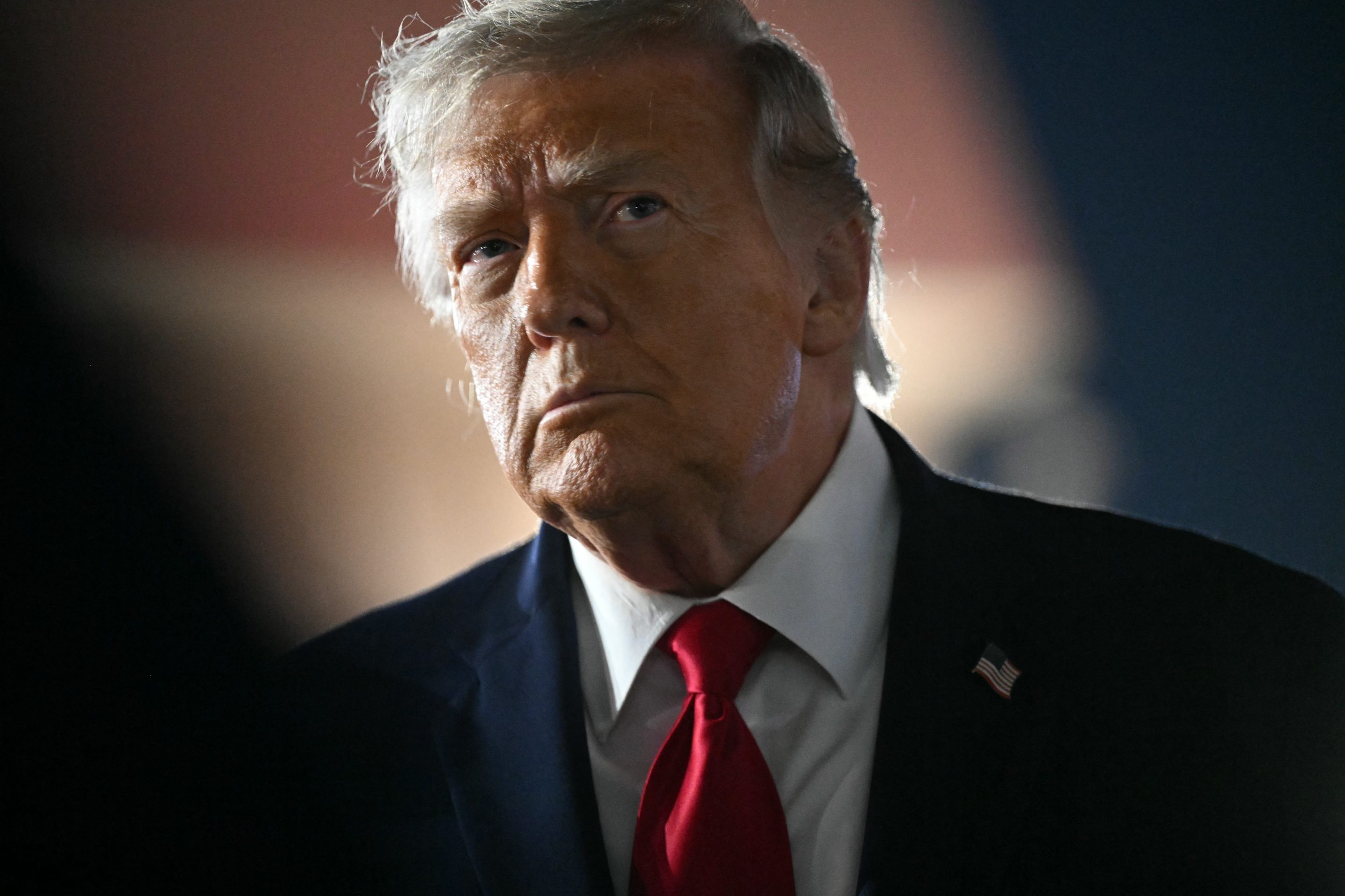 President Donald Trump speaks to the press before boarding Air Force One prior to departure from John F. Kennedy International Airport, in New York, on June 9, 2026.