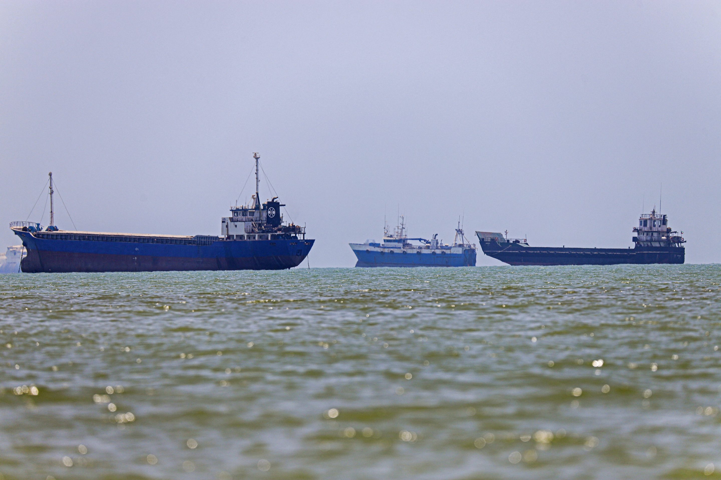 Vessels are seen anchored in Bandar Abbas along the Strait of Hormuz on June 18, 2026.