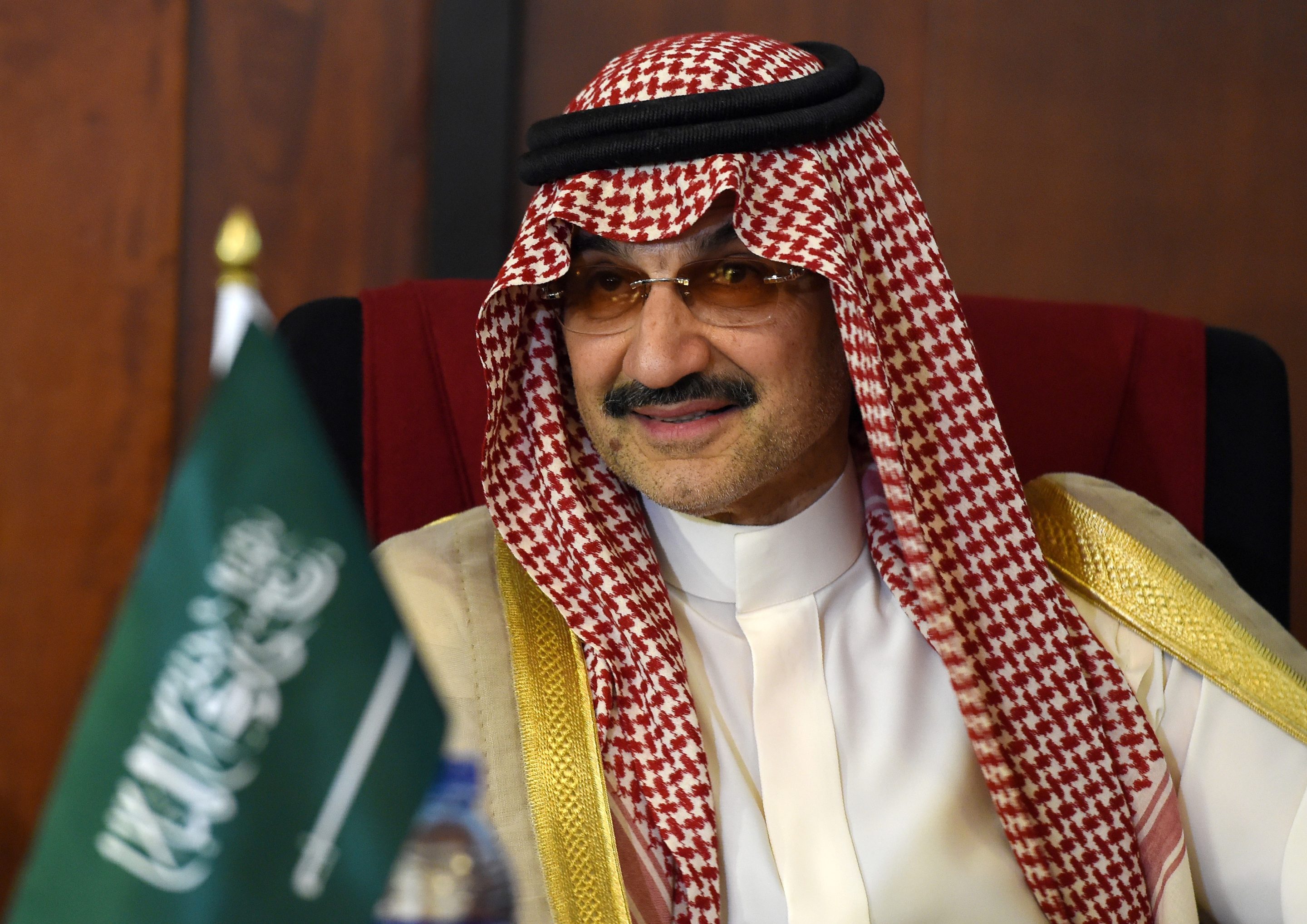 Saudi Arabian royal Al-Waleed Bin Talal bin Abdulaziz al Saud looks on during a meeting with Sri Lankan Foreign Minister Ravi Karunanayake in Colombo on July 4, 2017.