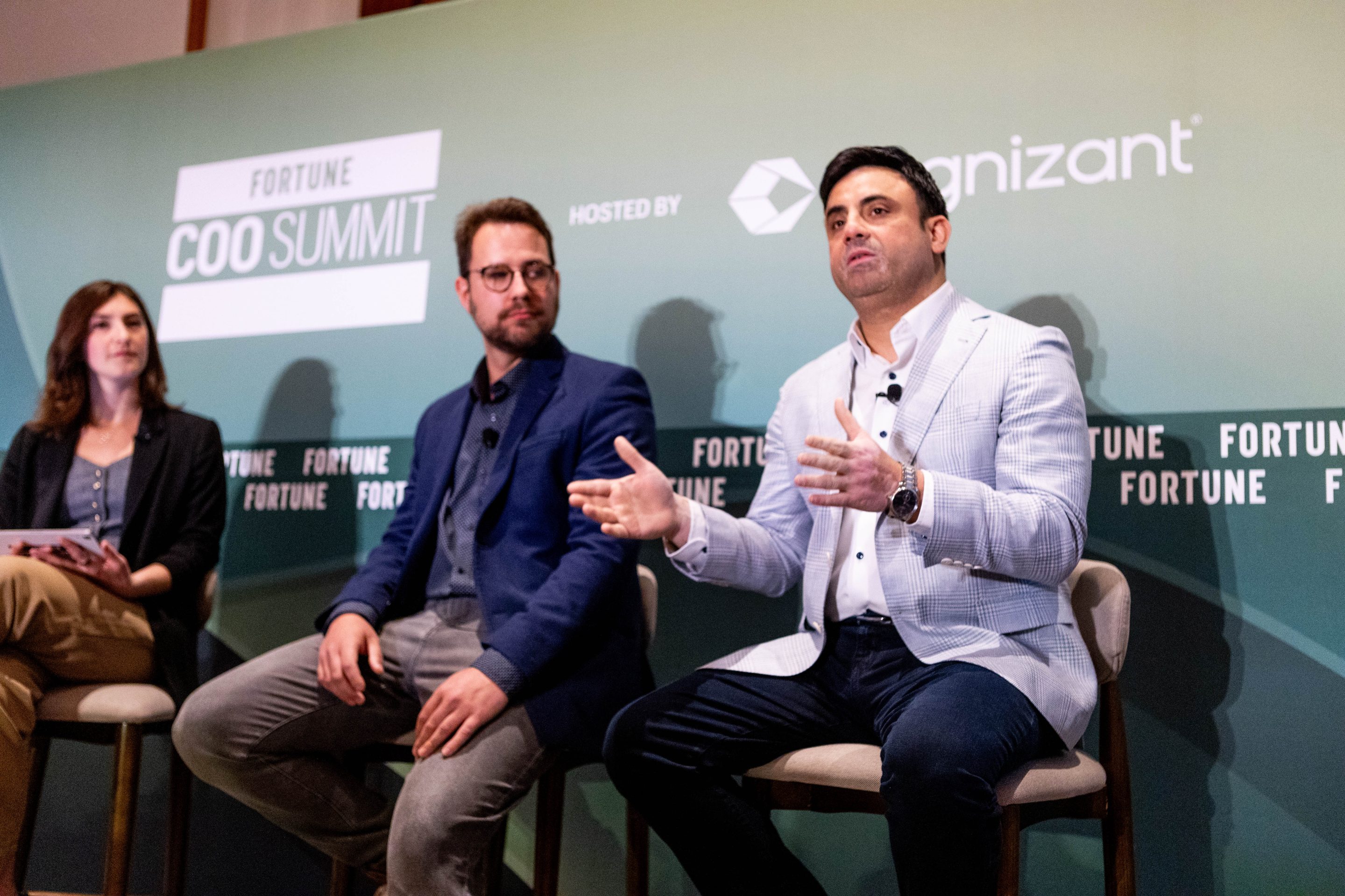 Ollie O’Donoghue, Cognizant Head of Research, and Sushant Warikoo, Cognizant Chief Business Officer, with
Fortune's Kristin Stoller at the Fortune COO Summit in Scottsdale, Arizona, on June 2, 2026.