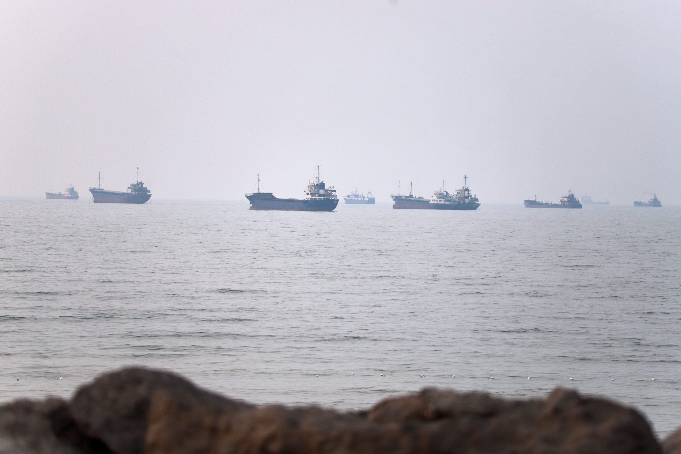 Commercial vessels are seen in the Strait of Hormuz off Bandar Abbas, Iran, Tuesday, June 30, 2026.