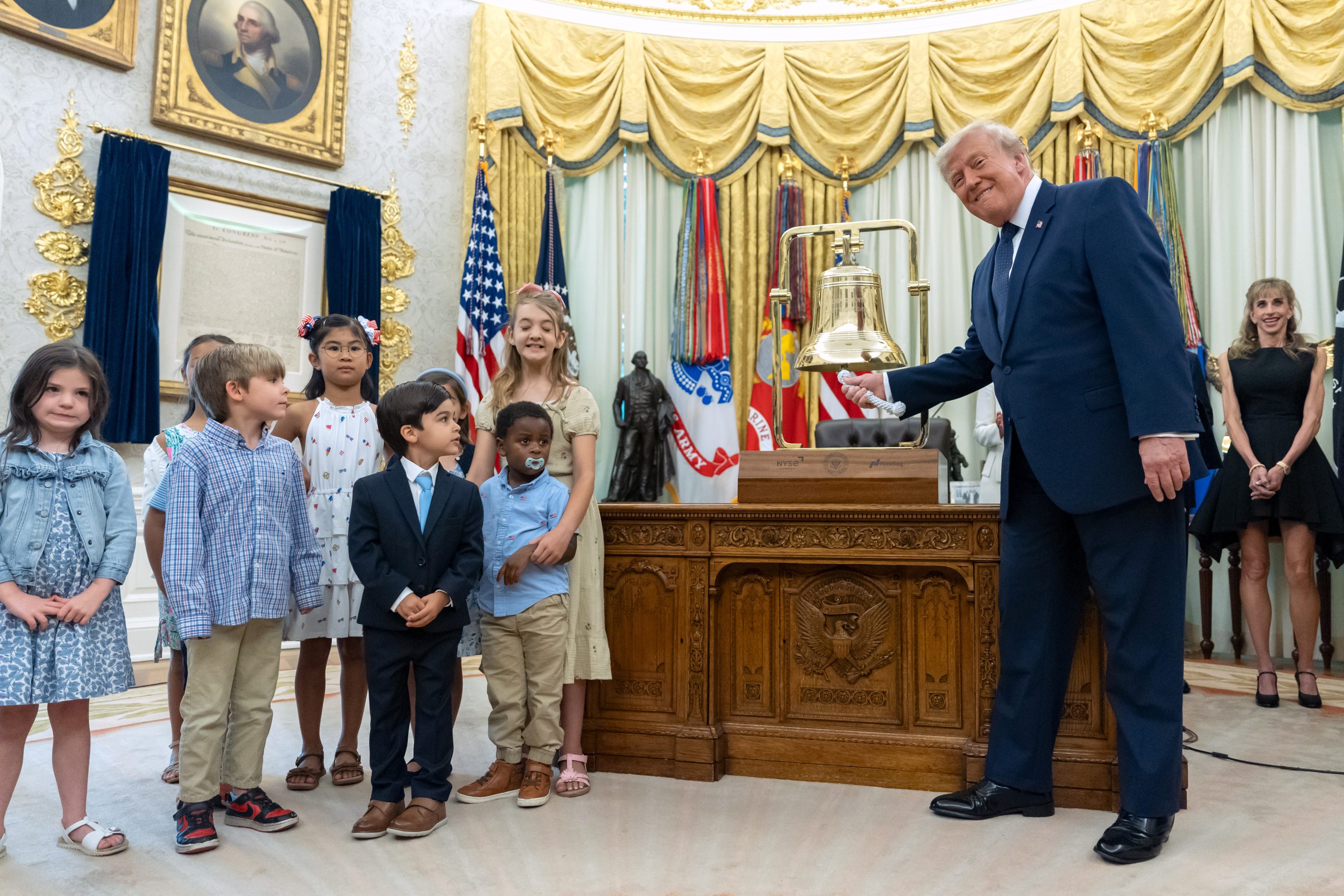 President Donald Trump rings the opening bell for the New York Stock Exchange and the Nasdaq in the Oval Office at the White House to celebrate Trump Accounts. 