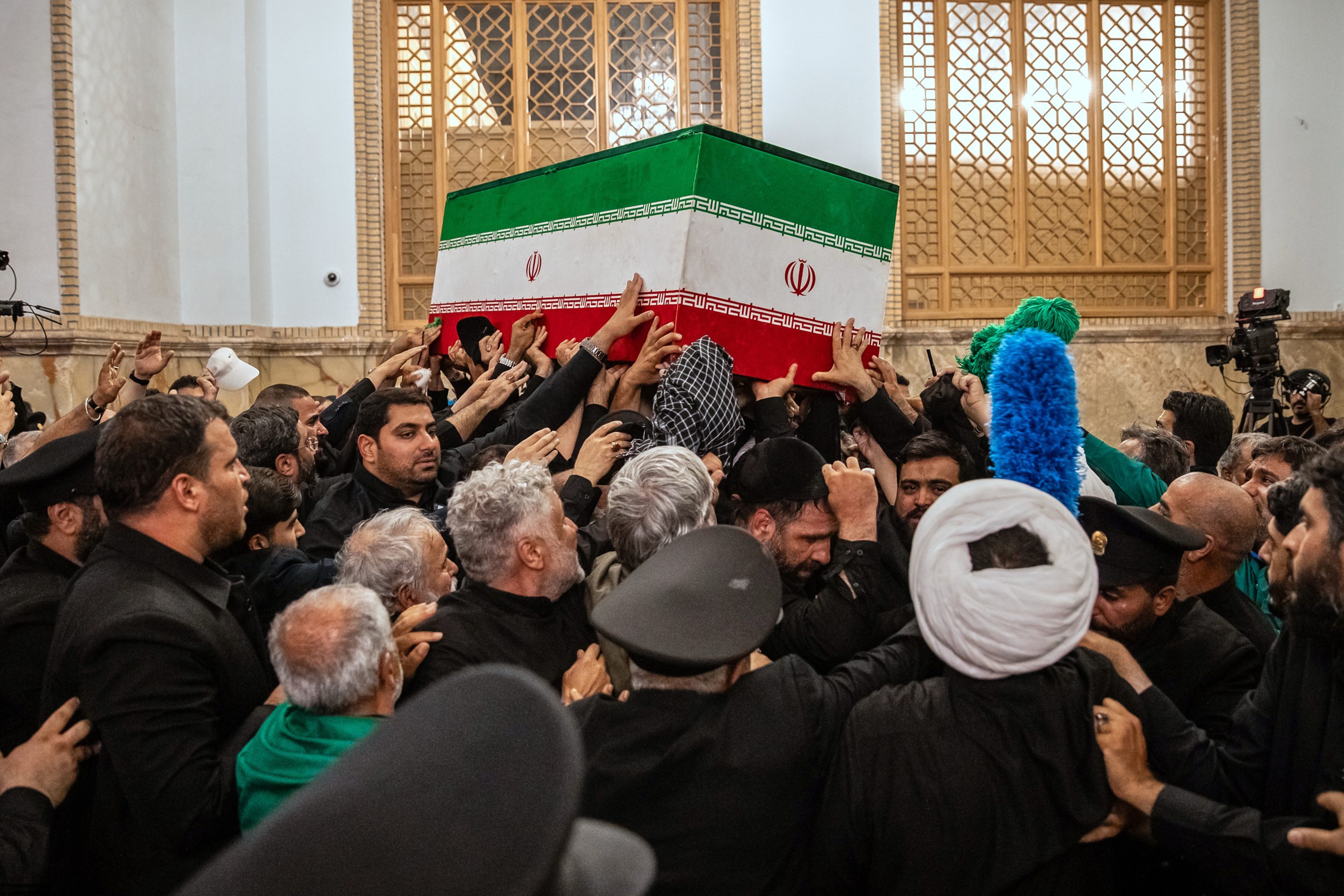 Mourners carry the coffin of the late Iranian Supreme Leader Ayatollah Ali Khamenei above the crowd for the final prayer before his burial at the Imam Reza Shrine in Mashhad, northeastern Iran, Thursday, July 9, 2026.