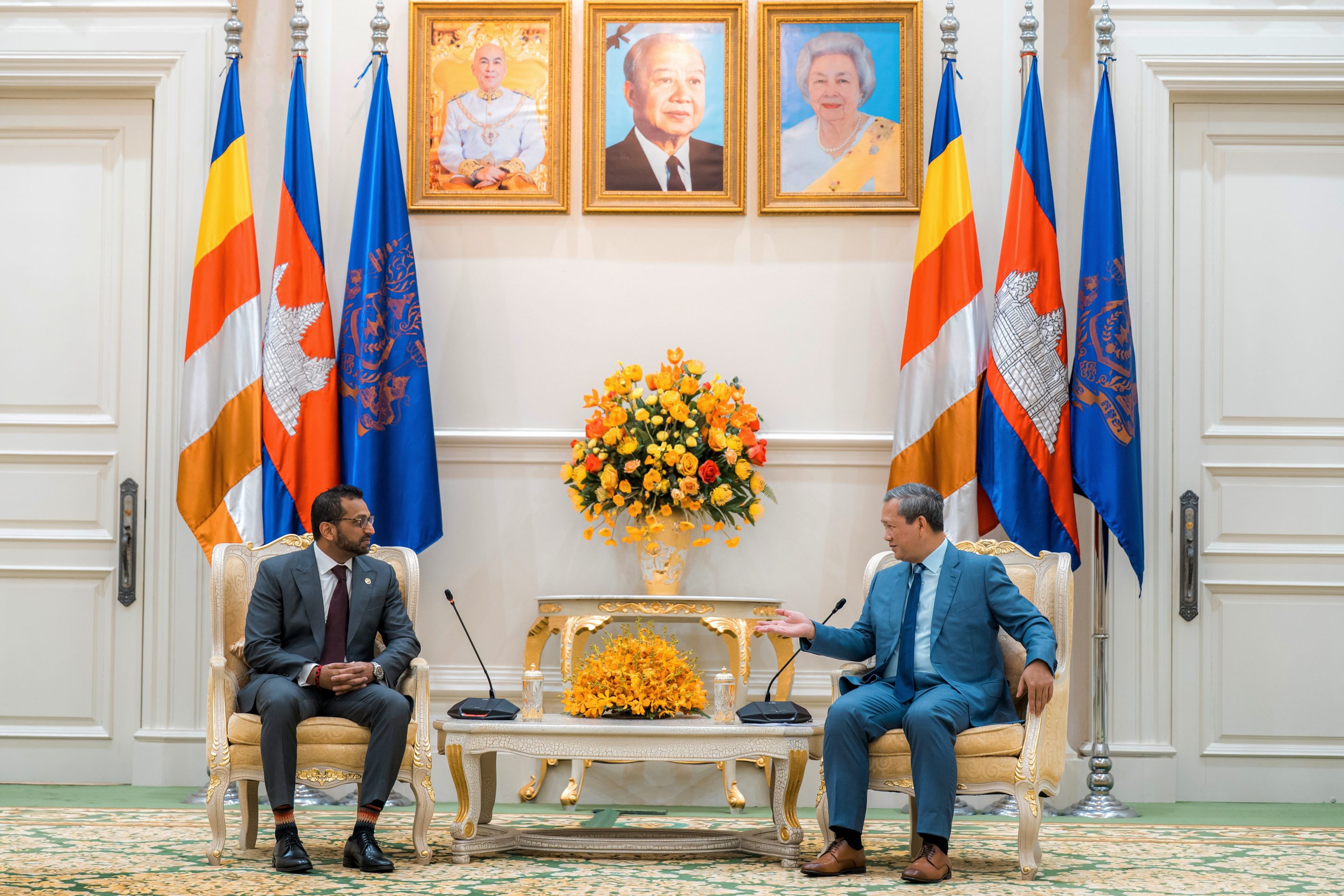 In this photo provided by Agence Kampuchea Press (AKP), U.S. FBI director Kash Patel, left, meets Cambodian Prime Minister Hun Manat at his offices in Phnom Penh, Cambodia on Thursday, July 22, 2026.  