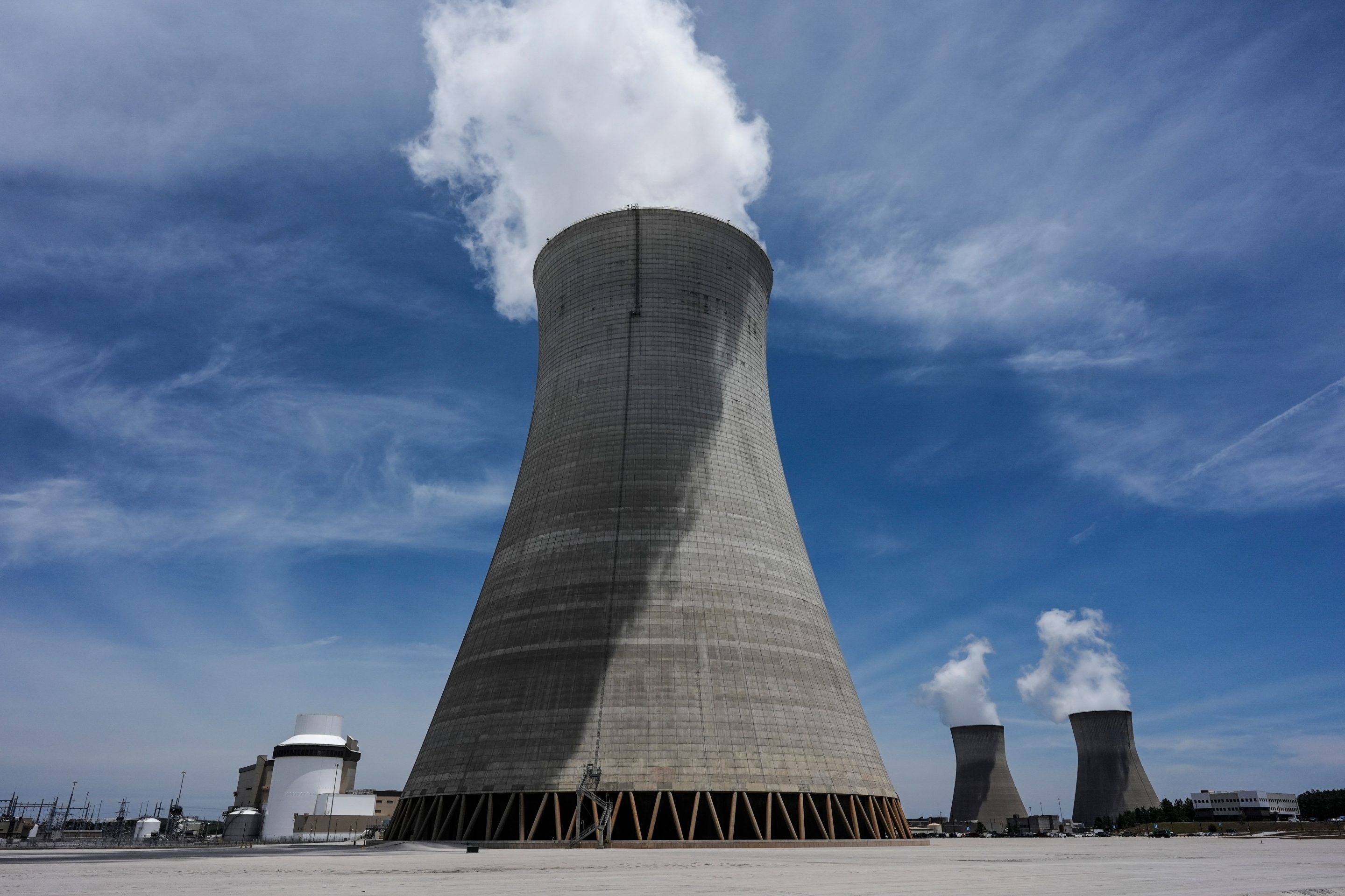 Cooling tower three with one and two in the background operate at the nuclear reactor facility at the Alvin W. Vogtle Electric Generating Plant, May 31, 2024, in Waynesboro, Ga.
