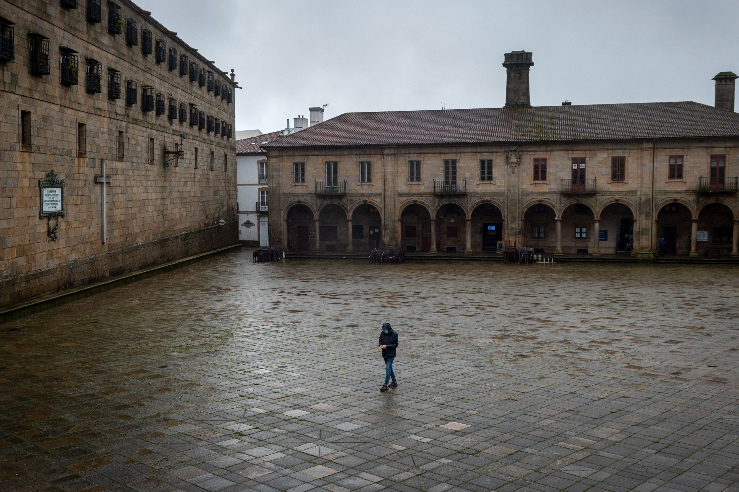 Covid public plaza one person walking