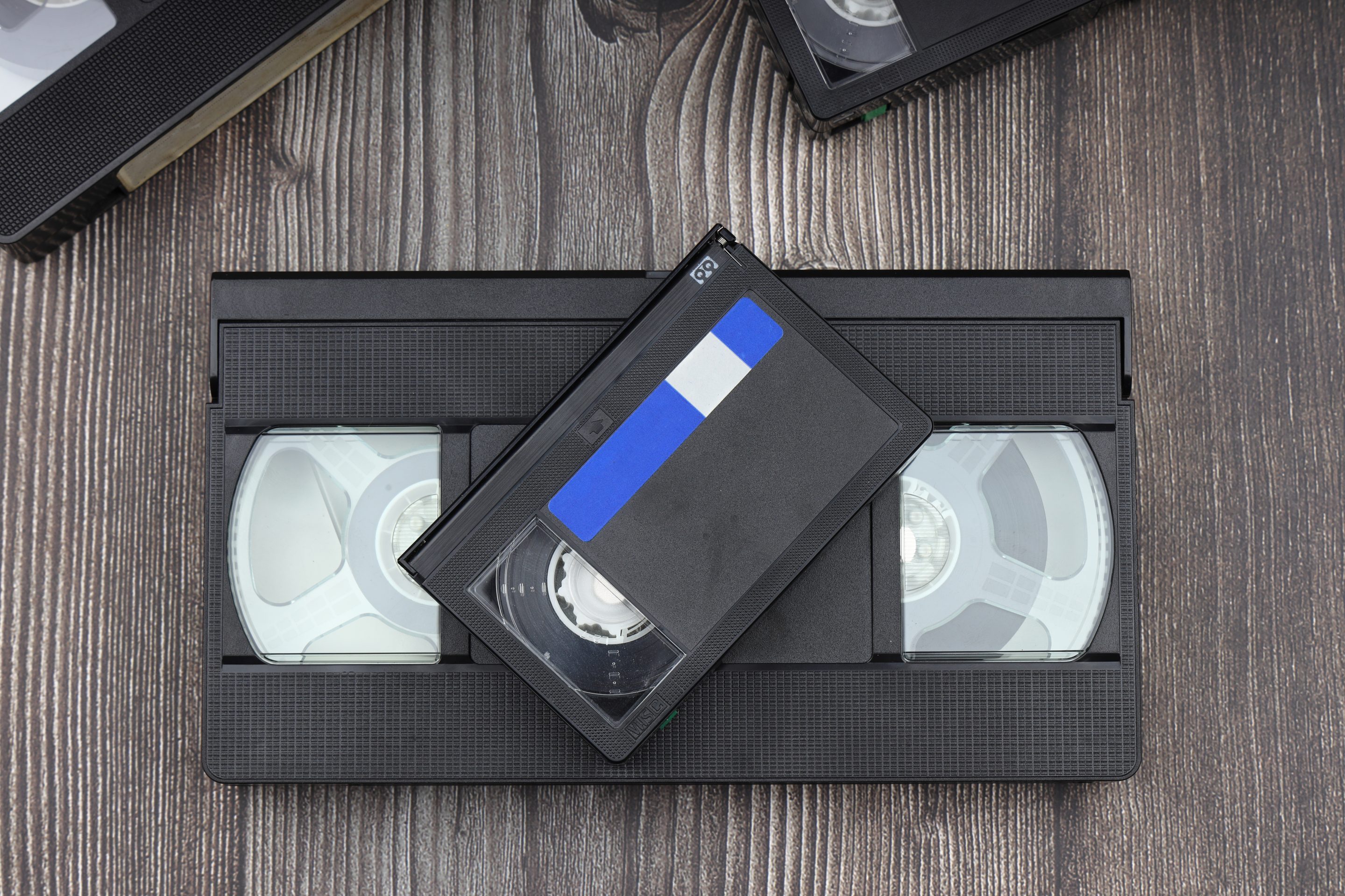 The VHS format prevailed because JVC licensed it broadly, allowing a self-reinforcing ecosystem to develop around it.