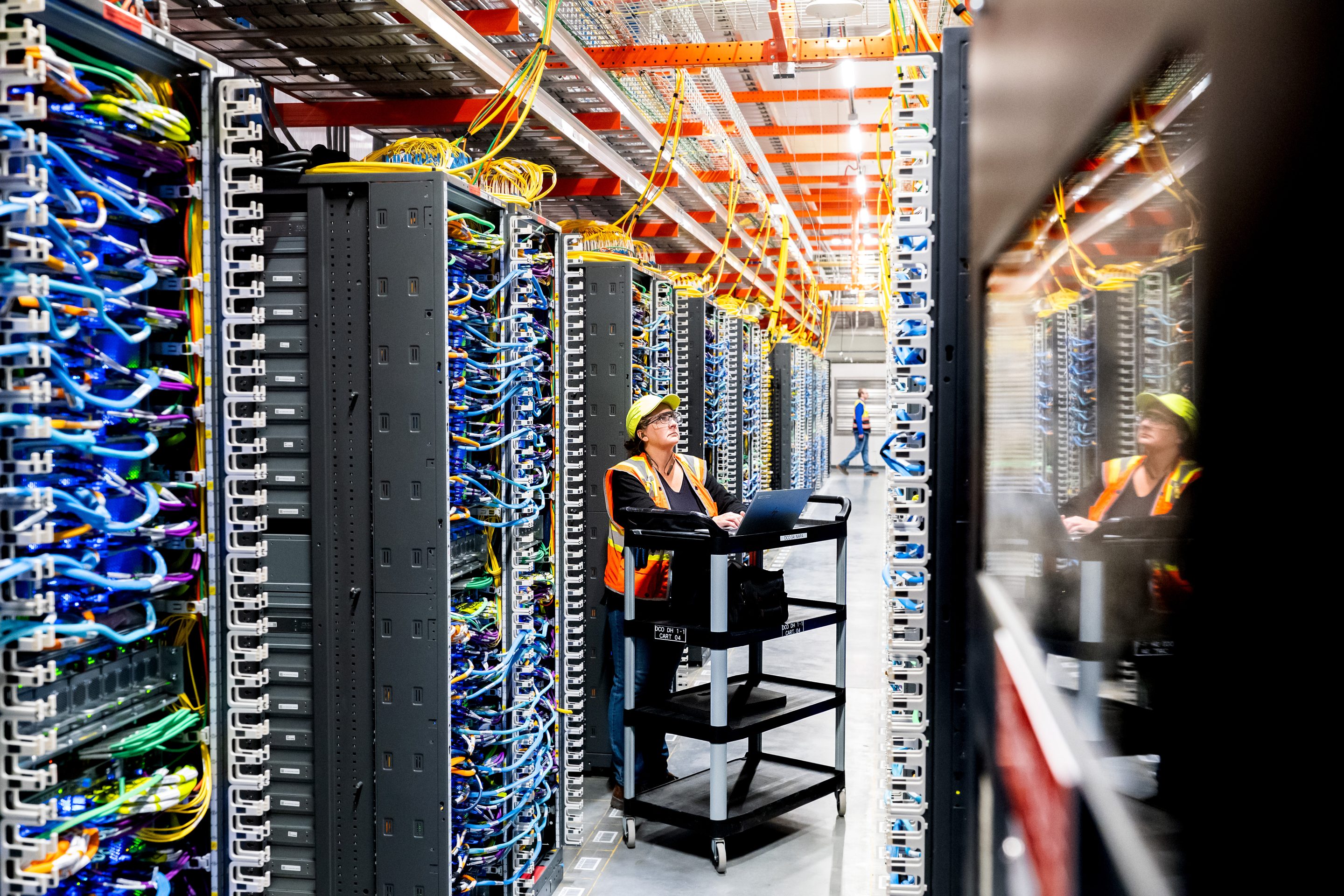 A technician at an Amazon Web Services AI data center in New Carlisle, Ind., Oct. 2, 2025.
