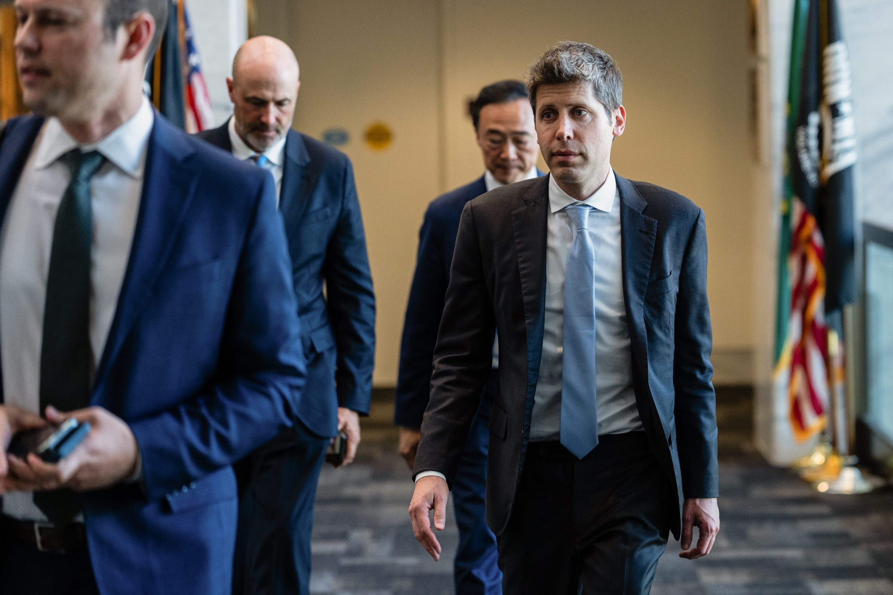 Sam Altman walking