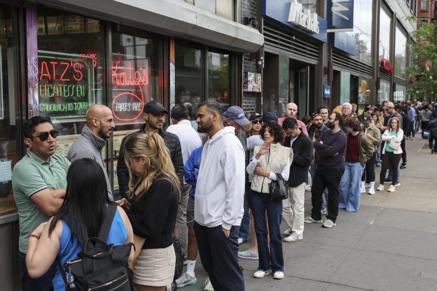 The rise of ‘conspicuous waiting’: The 19th-century economic theory that explains why Gen Z posts their place in line