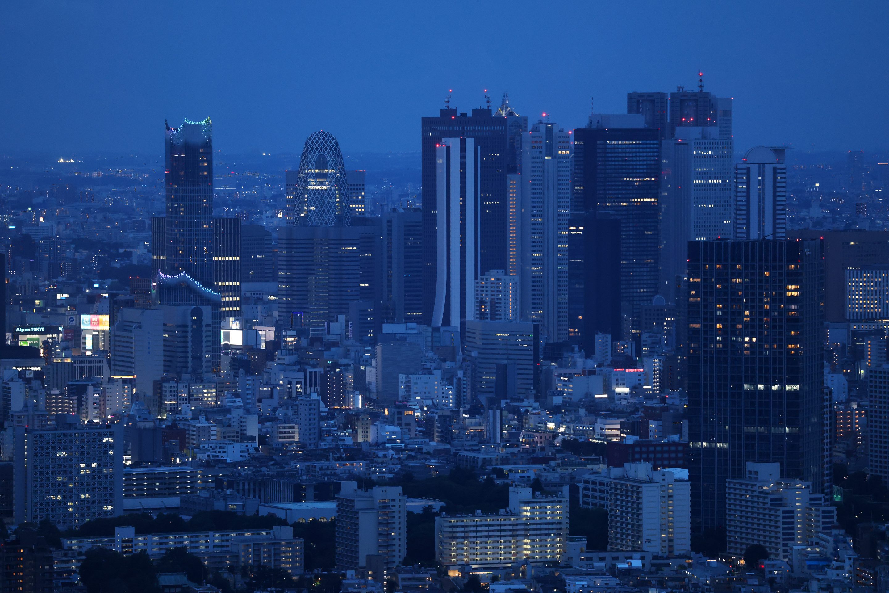 The Shinjuku skyline at dusk in Tokyo, Japan, on Sunday, June 14, 2026.