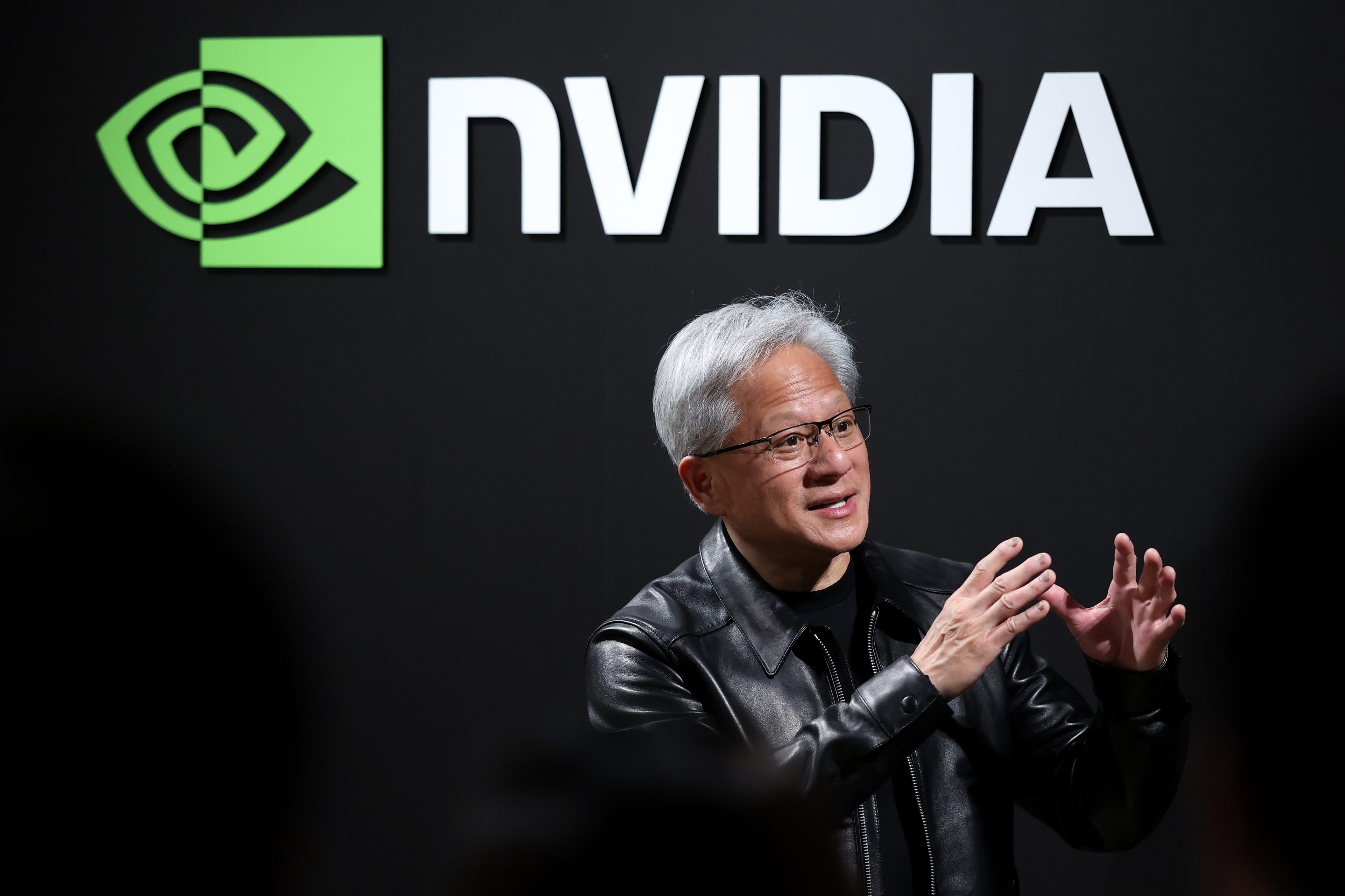 Jensen Huang, chief executive officer of Nvidia Corp., speaks to members of the media following the company's "Japan AI Ecosystem" reception in Tokyo, Japan, on Thursday, July 16, 2026.