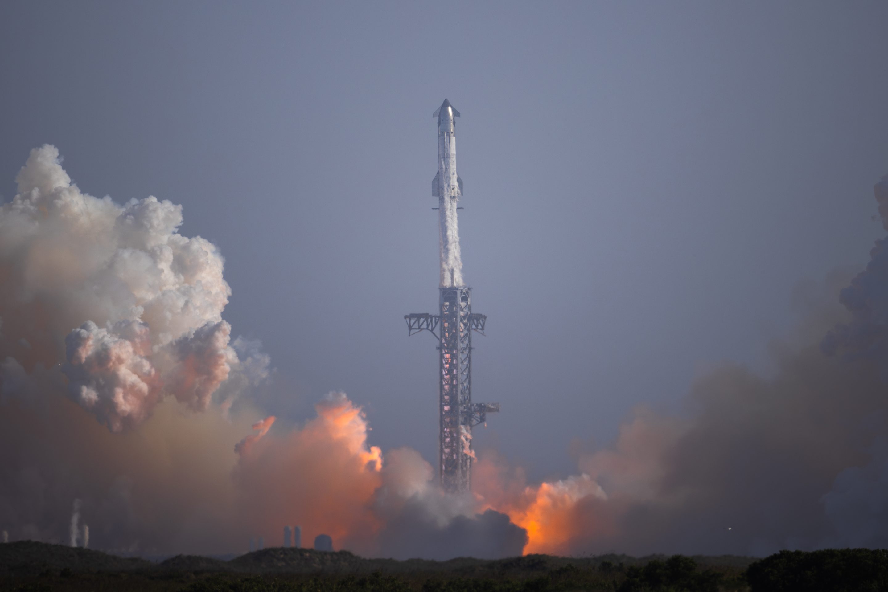 Starship 40 and Booster 20 launch from SpaceX's facility in Cameron County, Texas, on July 24, 2026, for what the company called ''Flight 13.''