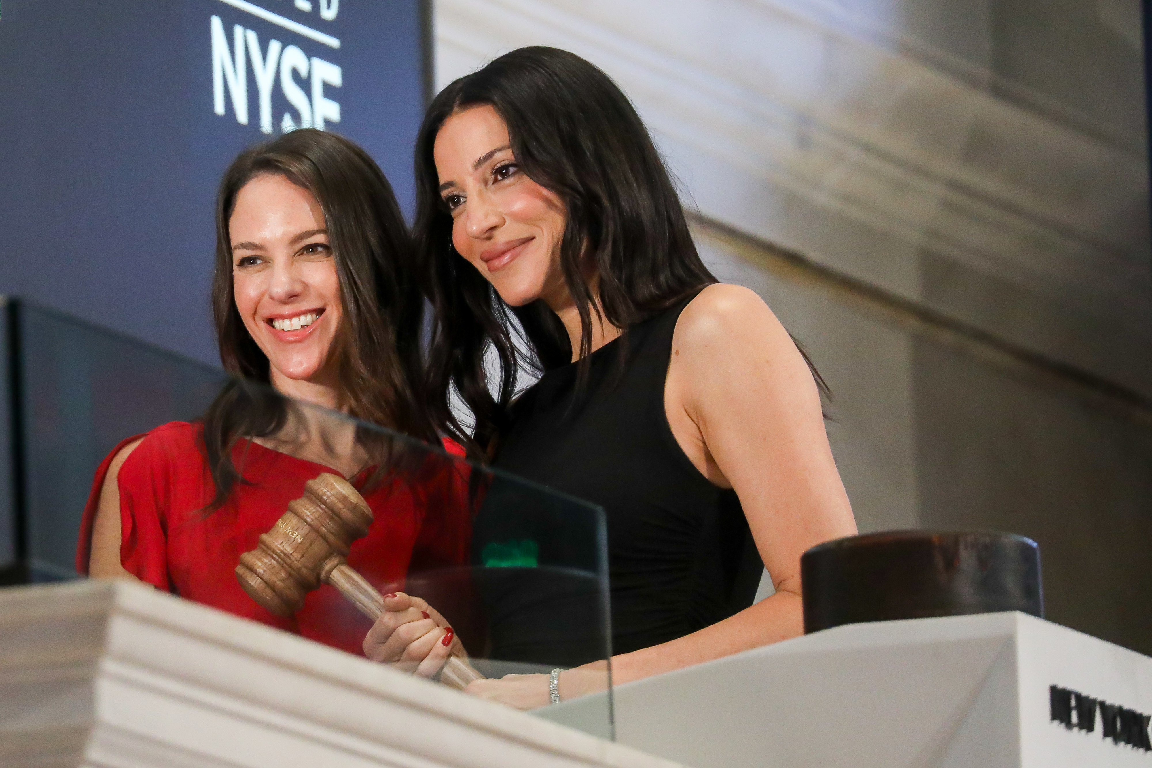 Reformation CEO Hali Borenstein, left, and founder Yael Aflalo celebrate the brand's listing on the New York Stock Exchange.