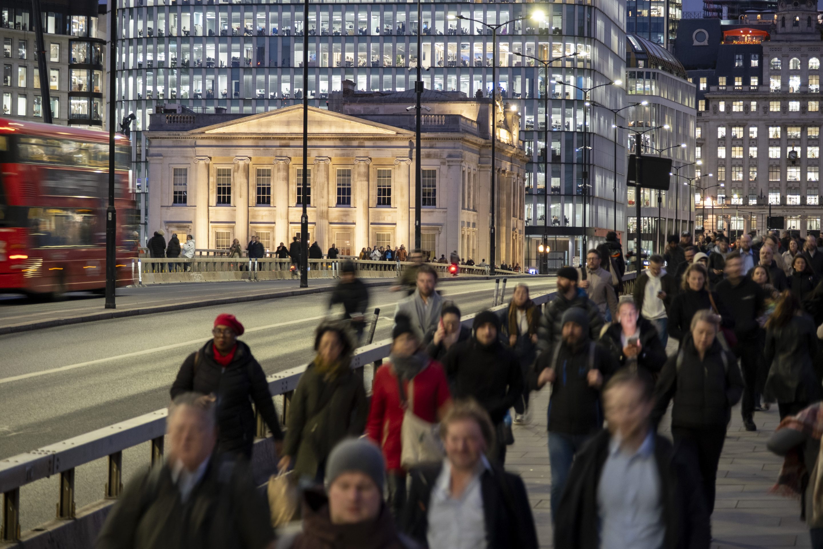 City workers, commuters and other people crossing London Bridge on the daily after-work routine towards the major transport hubs just across from the City of London on 27th November 2025.