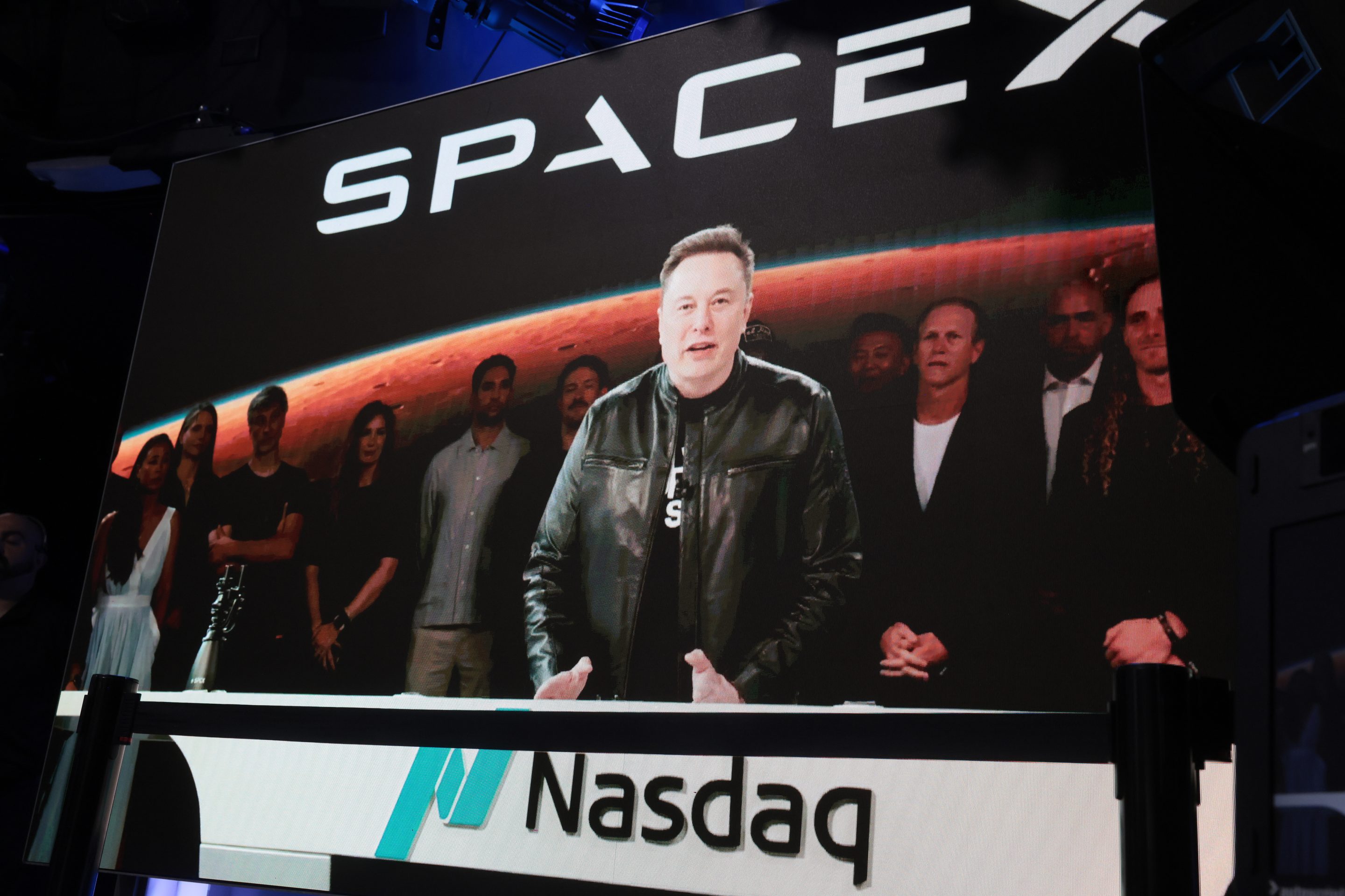Elon Musk, founder and CEO of SpaceX, speaks via video before the ringing of opening bell at the Nasdaq Marketsite at the launch of the company's initial public offering (IPO) on June 12, 2026.