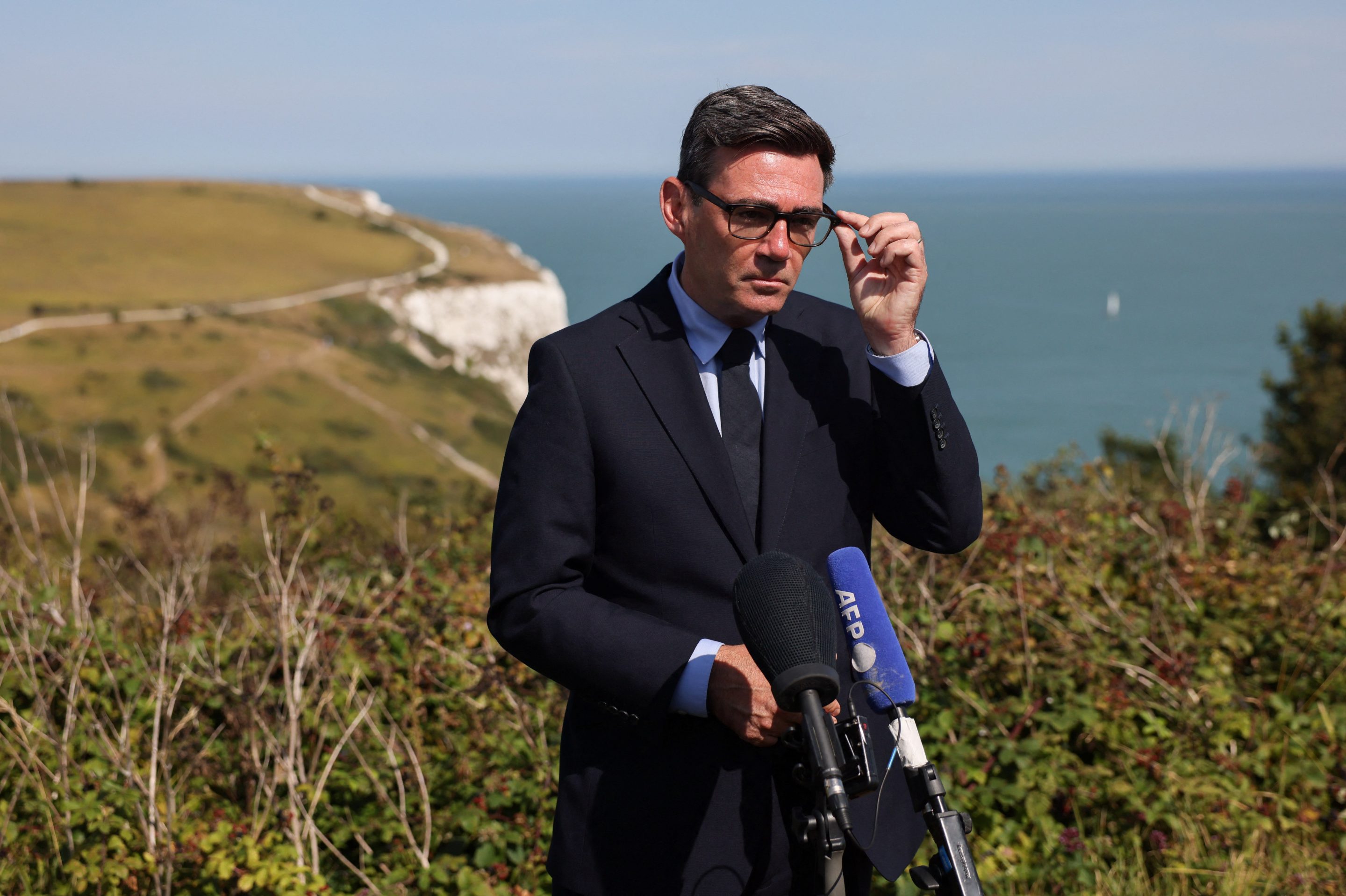 British Prime Minister Andy Burnham speaks to the press, as he makes a visit to HM Coastguard Maritime Rescue Coordination Centre, on August 2, 2026 in Dover, England.