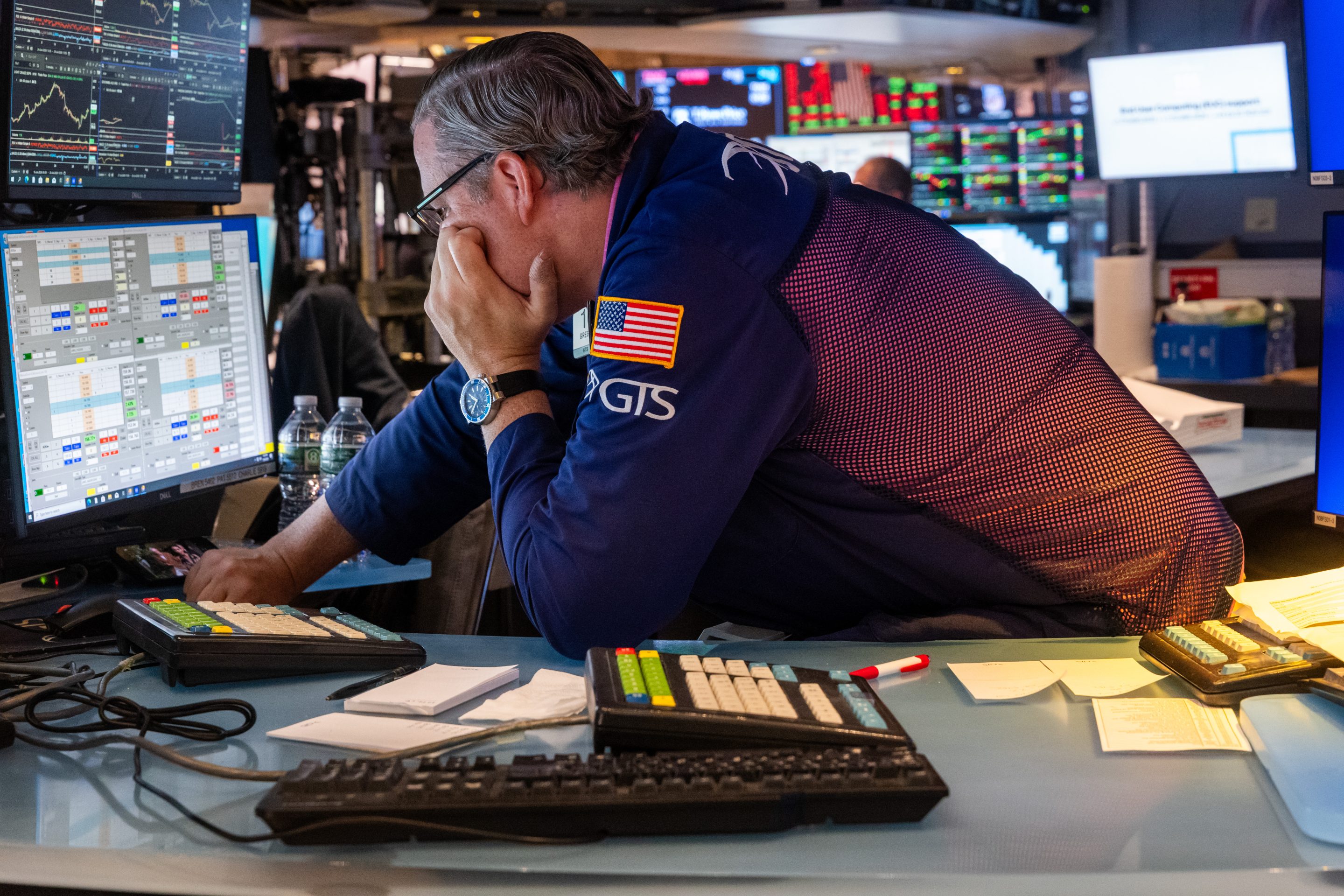 Traders work on the New York Stock Exchange (NYSE) on July 29, 2026.